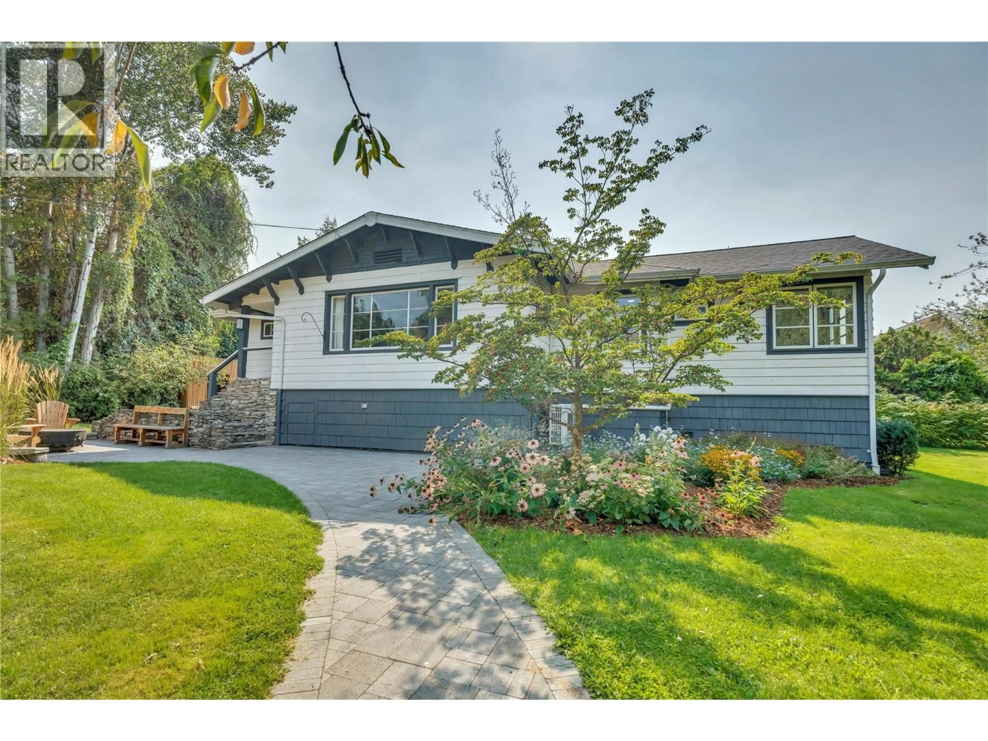 Home with vinyl exterior material, street for 480 ROBINSON AVENUE, Naramata British Columbia V0H1N0