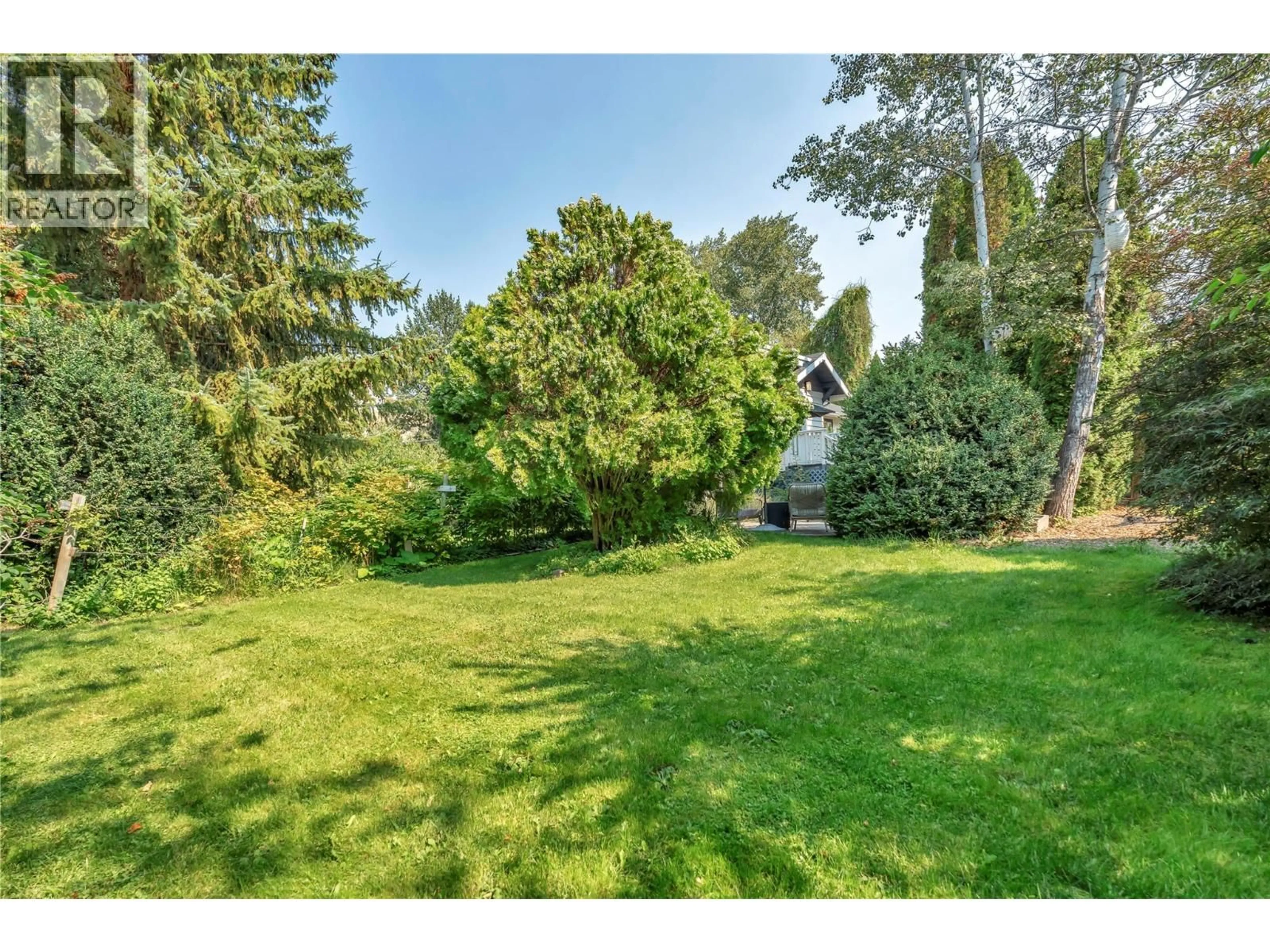A pic from outside/outdoor area/front of a property/back of a property/a pic from drone, forest/trees view for 480 ROBINSON AVENUE, Naramata British Columbia V0H1N0