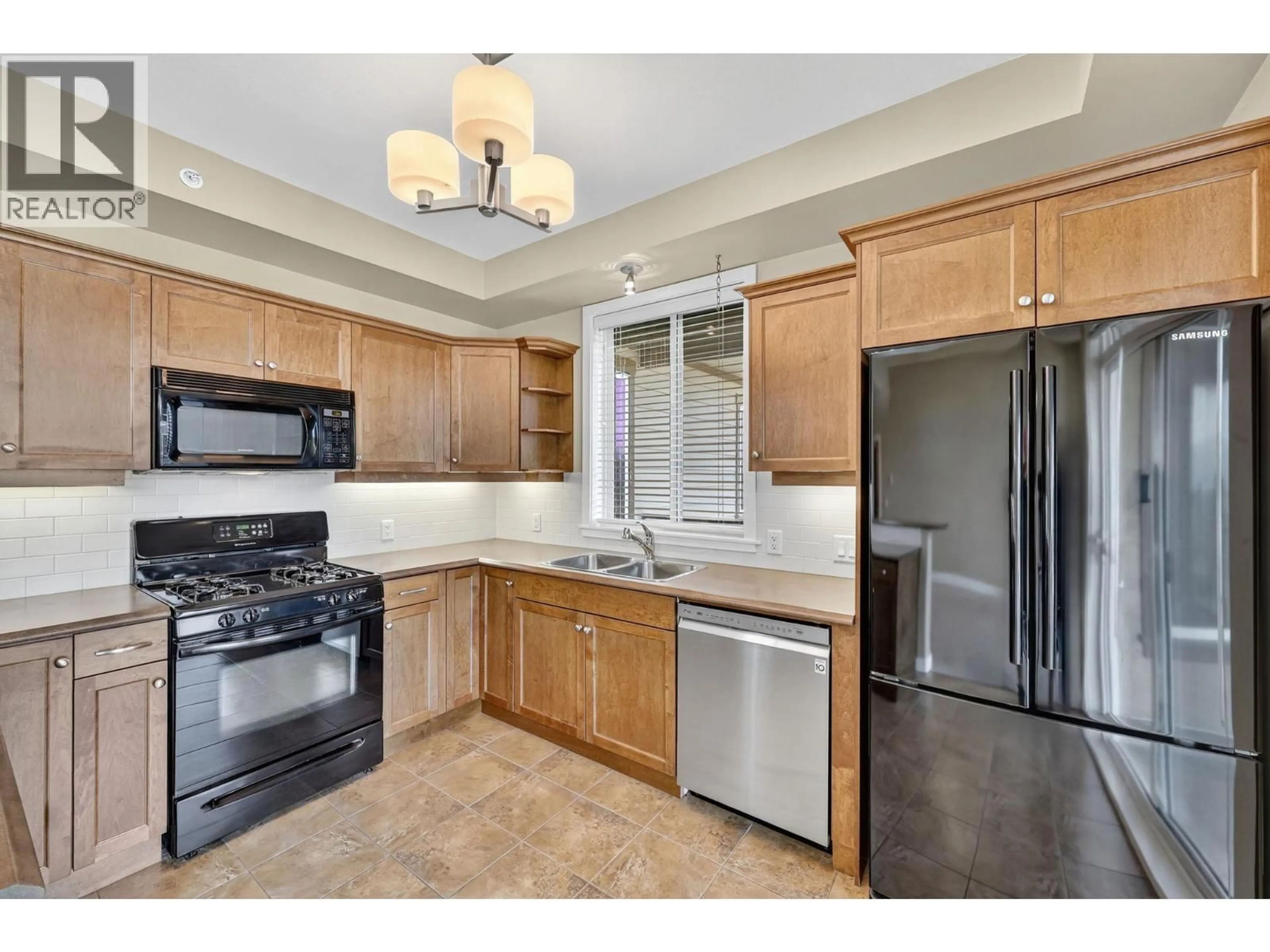 Standard kitchen, ceramic/tile floor for 418 - 2532 SHORELINE DRIVE, Lake Country British Columbia V4V2R6