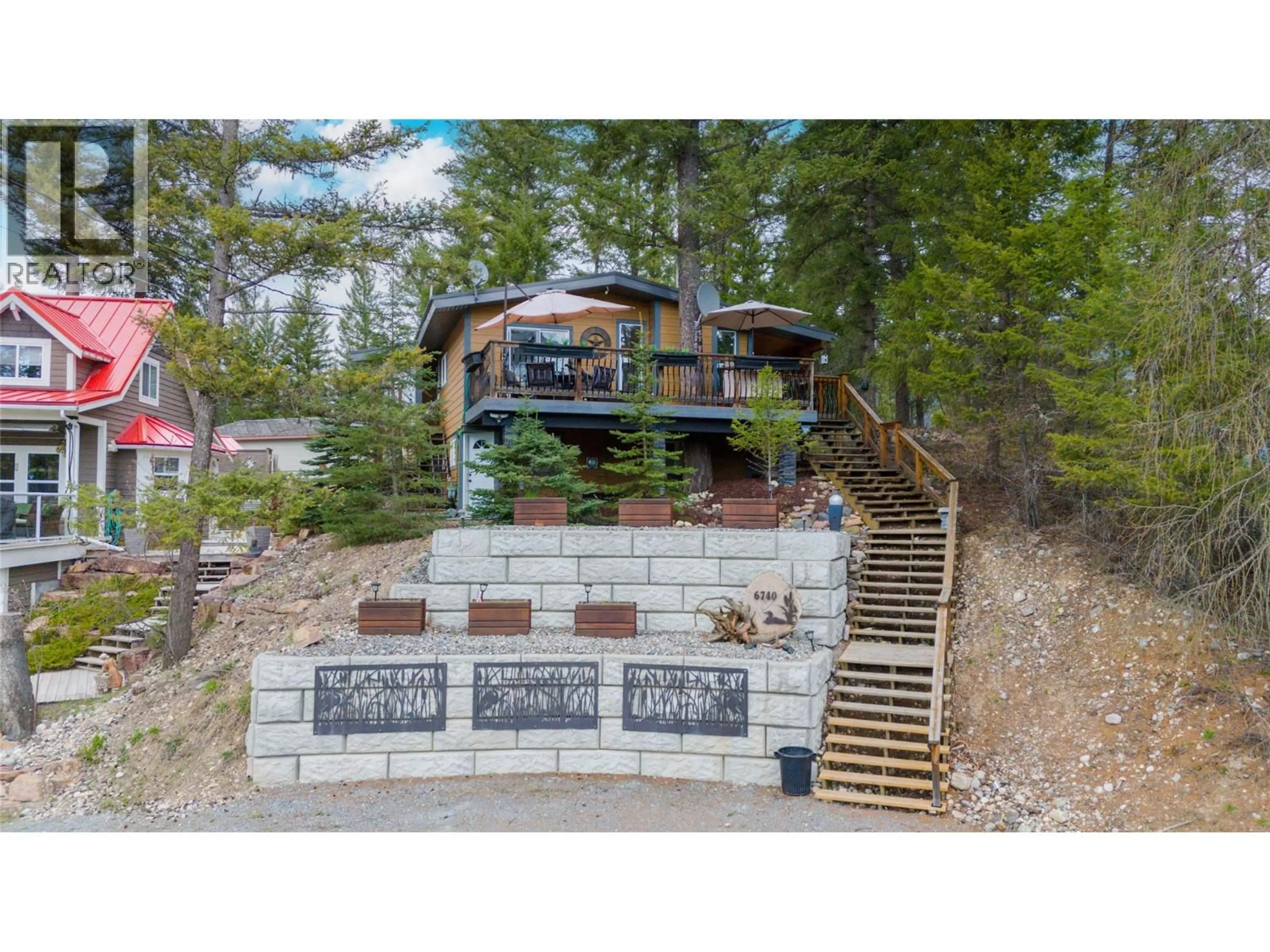 A pic from outside/outdoor area/front of a property/back of a property/a pic from drone, unknown for 6740 ROSEN LAKE ROAD, Jaffray British Columbia V0B1T0
