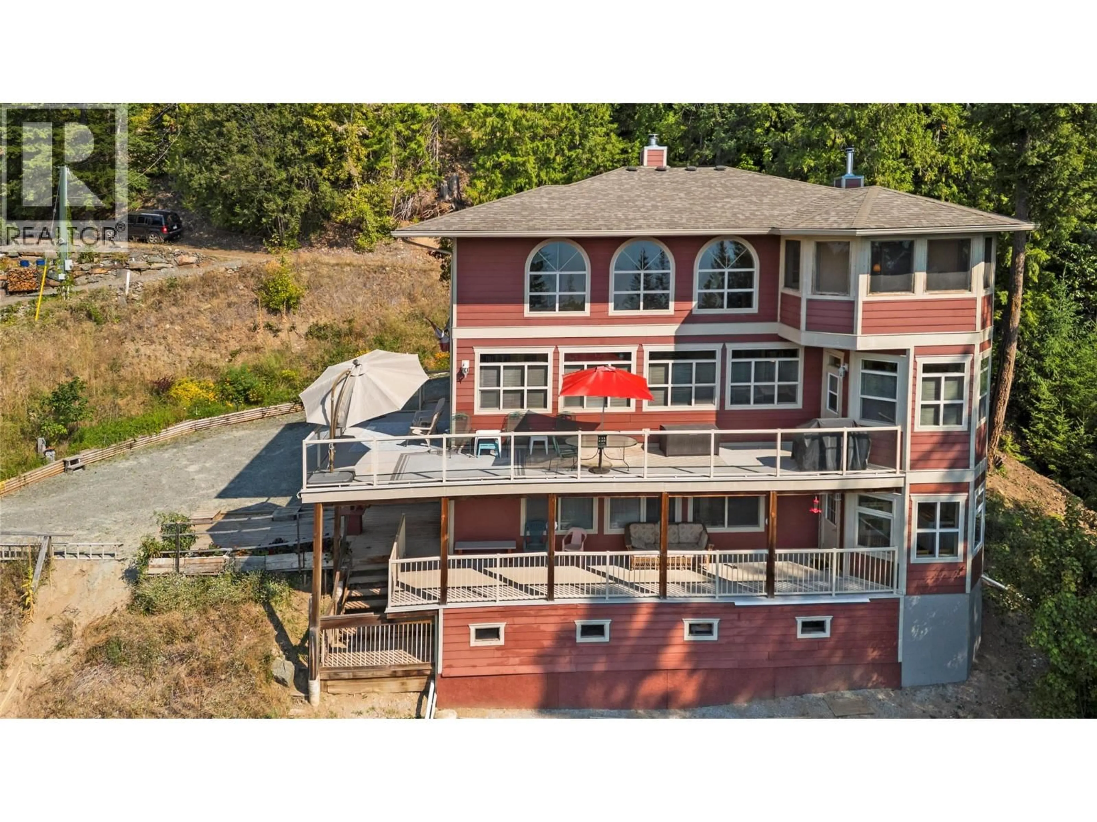 A pic from outside/outdoor area/front of a property/back of a property/a pic from drone, water/lake/river/ocean view for 7666 LICHEN ROAD, Anglemont British Columbia V0E1M8