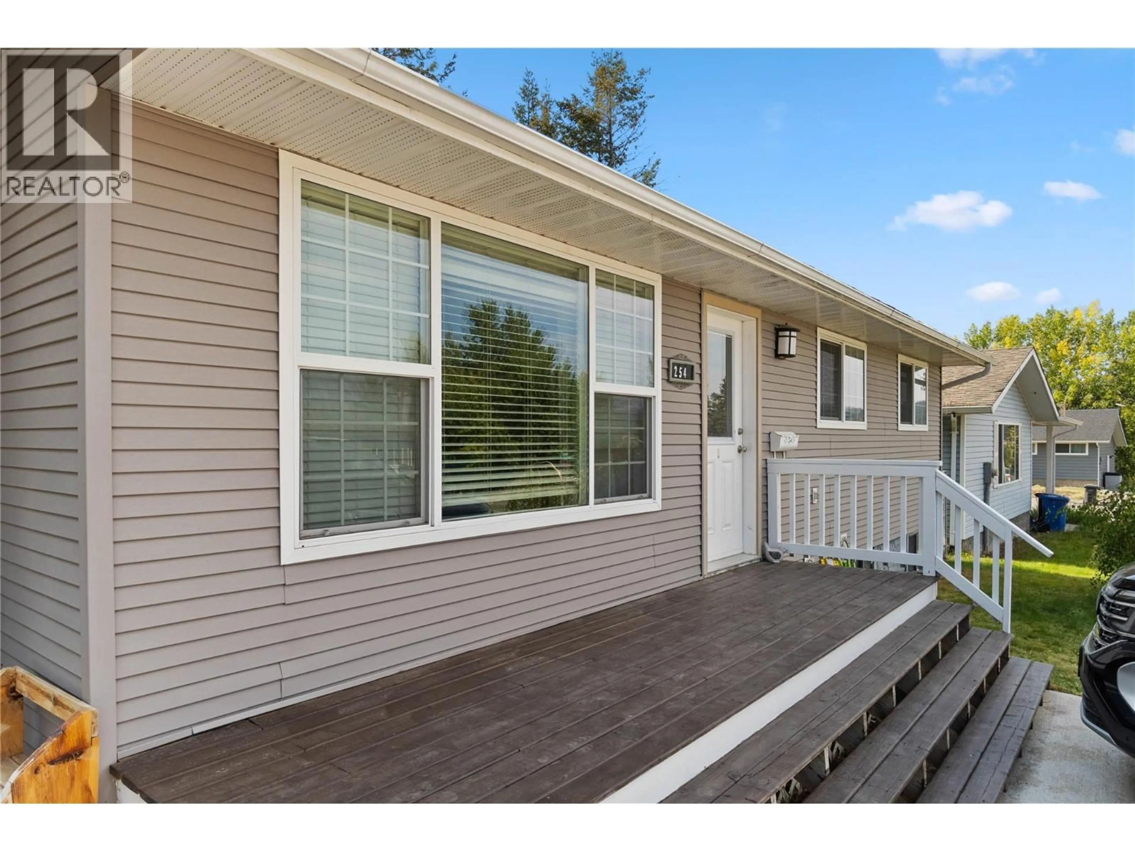 Home with vinyl exterior material, street for 254 ALDER DRIVE, Logan Lake British Columbia V0K1W0