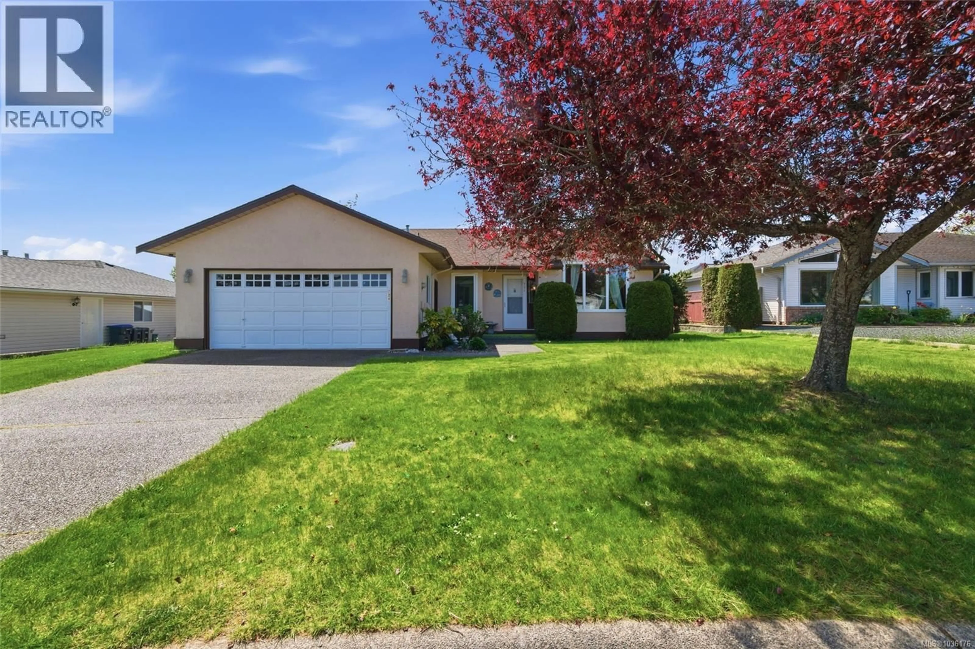 Home with vinyl exterior material, street for 704 ERMINESKIN AVENUE, Parksville British Columbia V9P2L4