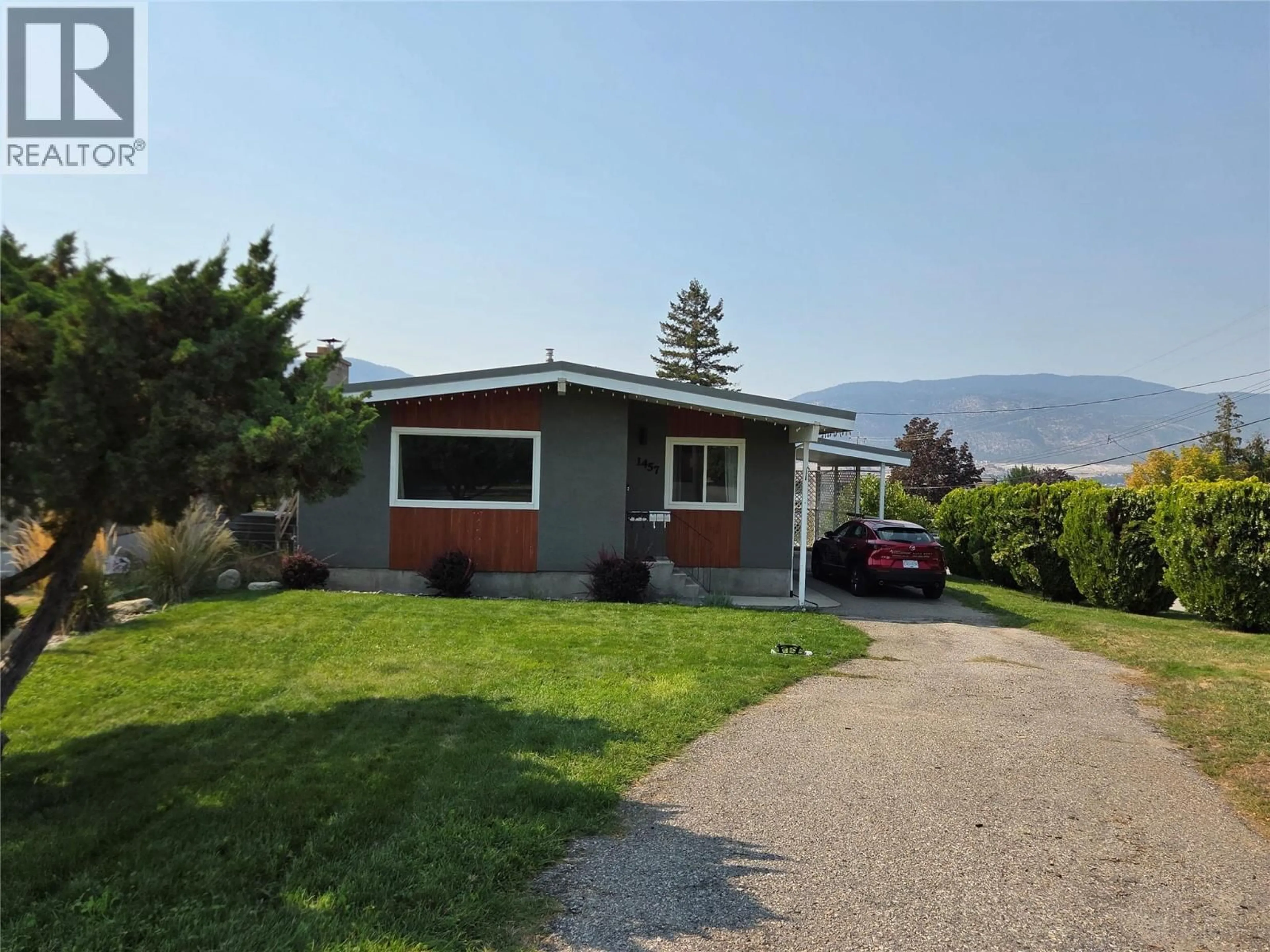 Home with vinyl exterior material, mountain view for 1457 CARMI DRIVE, Penticton British Columbia V2A4R9