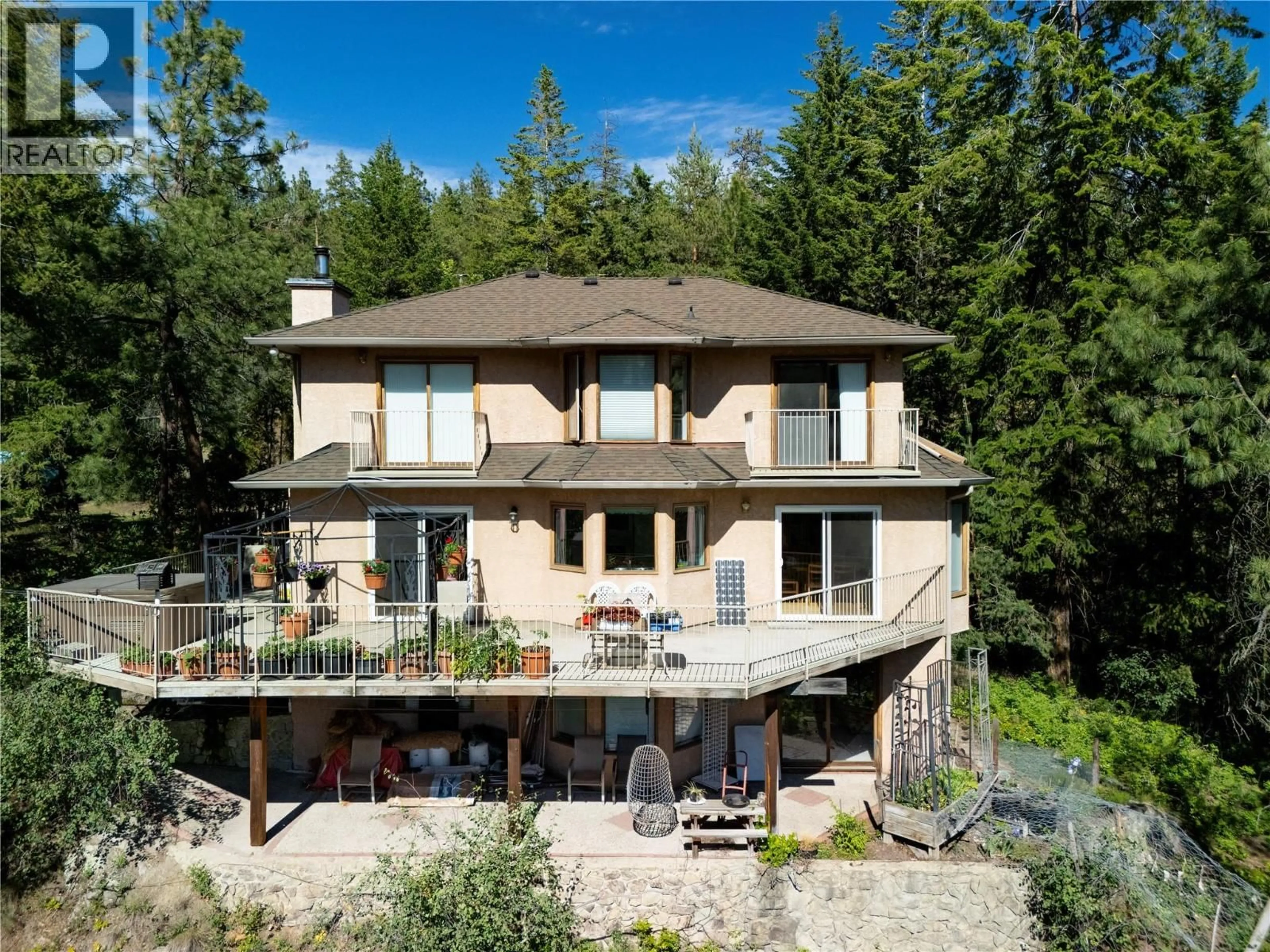 A pic from outside/outdoor area/front of a property/back of a property/a pic from drone, unknown for 440 GRAINGER ROAD, Kelowna British Columbia V1V1C8