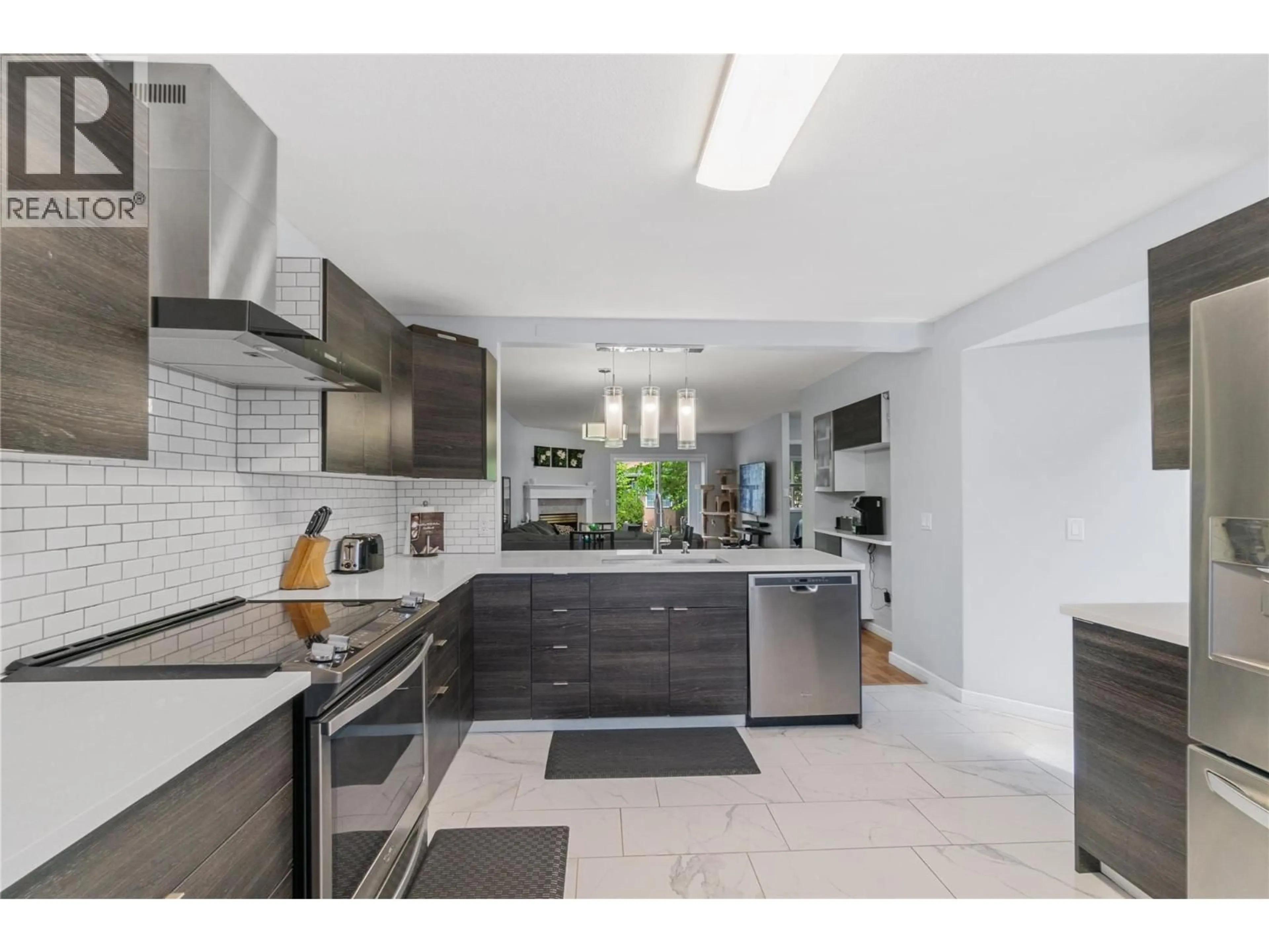 Contemporary kitchen, ceramic/tile floor for 25 - 535 GLENMEADOWS ROAD, Kelowna British Columbia V1V1X7
