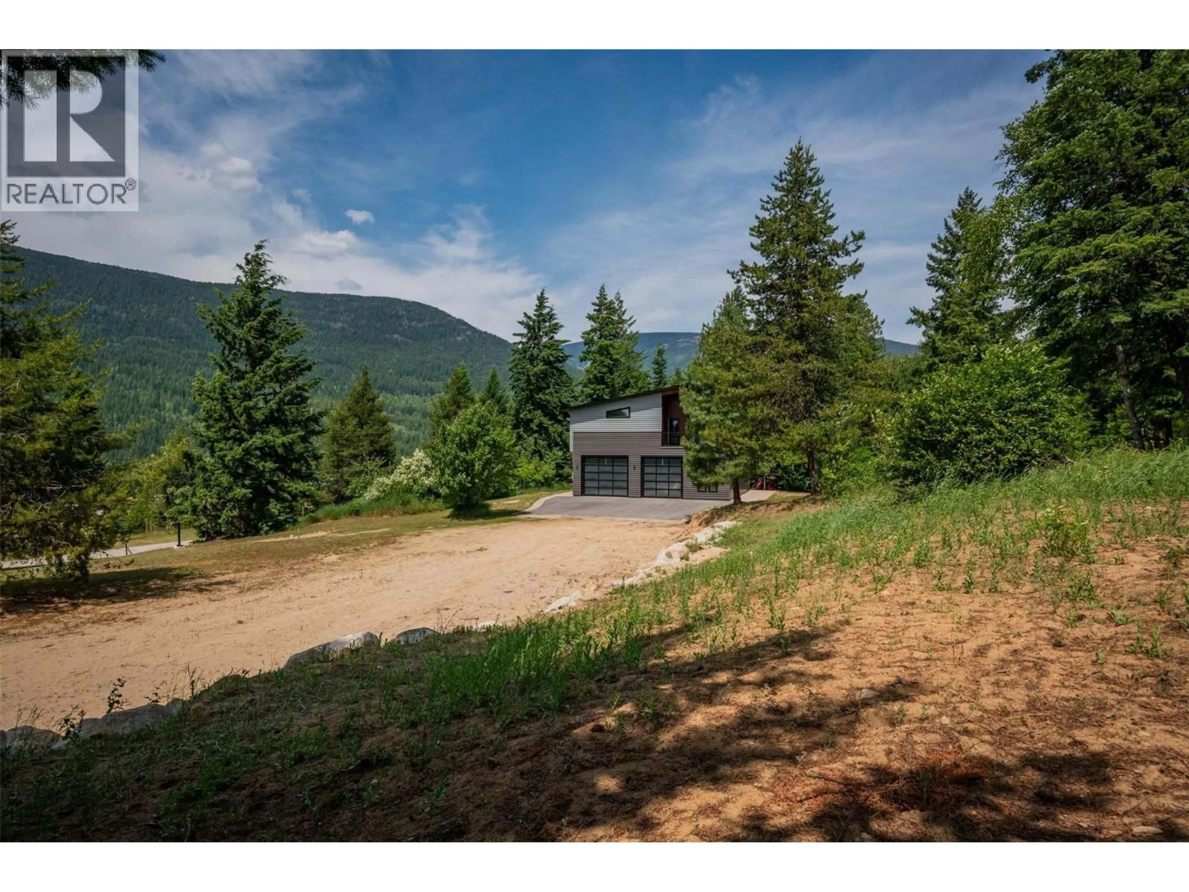A pic from outside/outdoor area/front of a property/back of a property/a pic from drone, mountain view for 1959 SANDY ROAD, Castlegar British Columbia V1N4T1