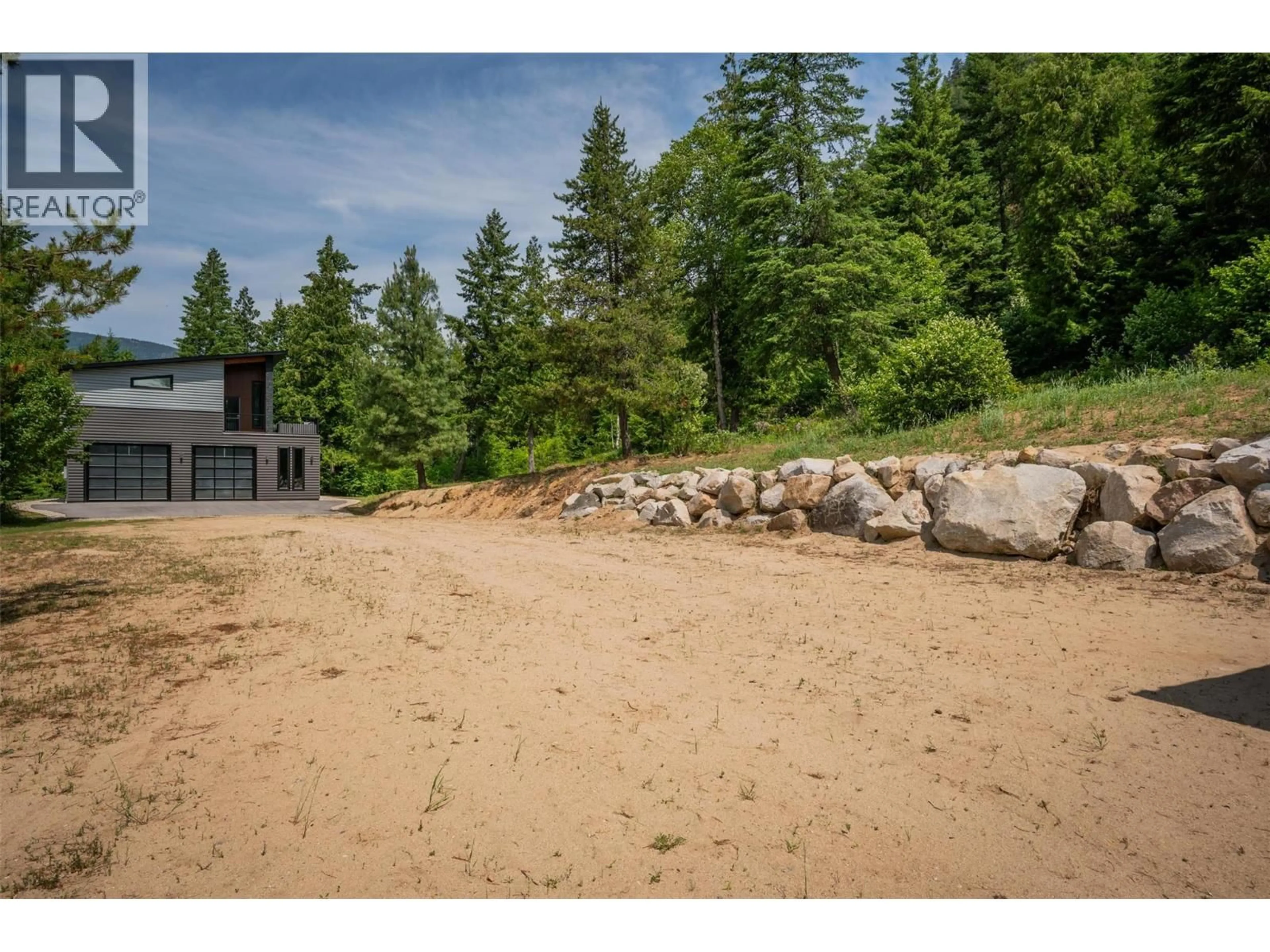 A pic from outside/outdoor area/front of a property/back of a property/a pic from drone, water/lake/river/ocean view for 1959 SANDY ROAD, Castlegar British Columbia V1N4T1