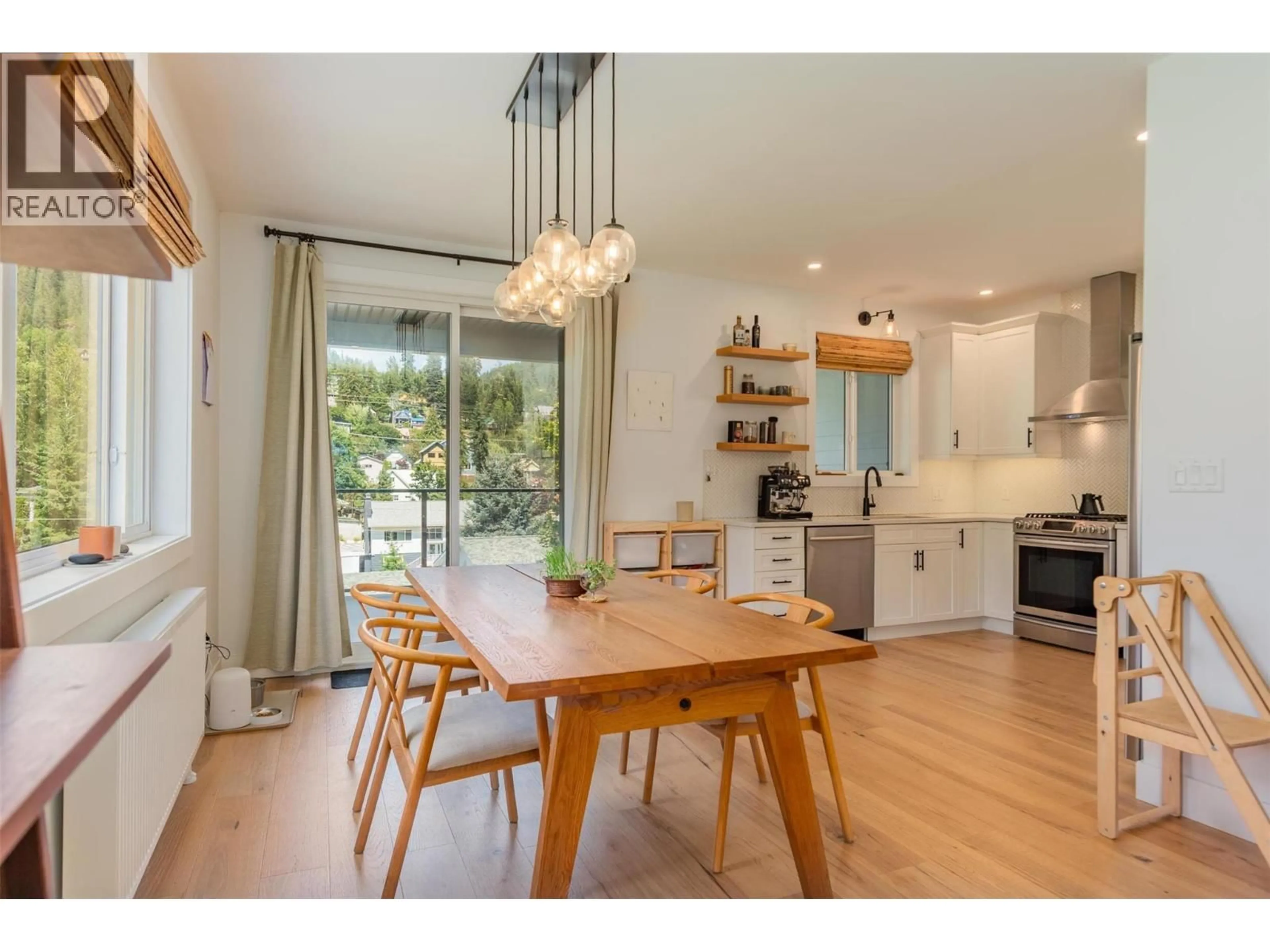 Open concept kitchen, wood/laminate floor for A - 1606 THOMPSON AVENUE, Rossland British Columbia V0G1Y0
