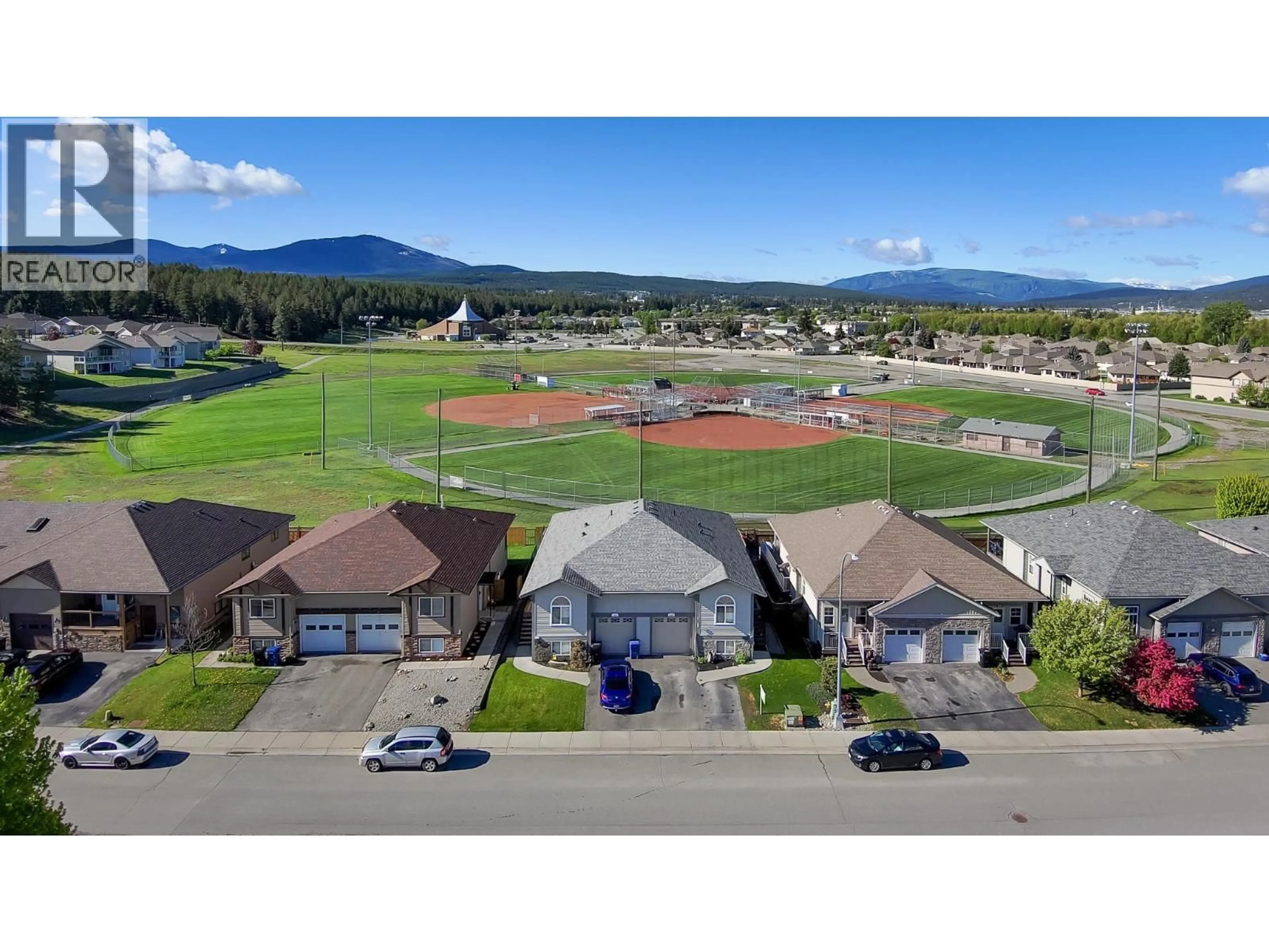 A pic from outside/outdoor area/front of a property/back of a property/a pic from drone, mountain view for A - 1849 KELOWNA CRESCENT, Cranbrook British Columbia V1C6L6