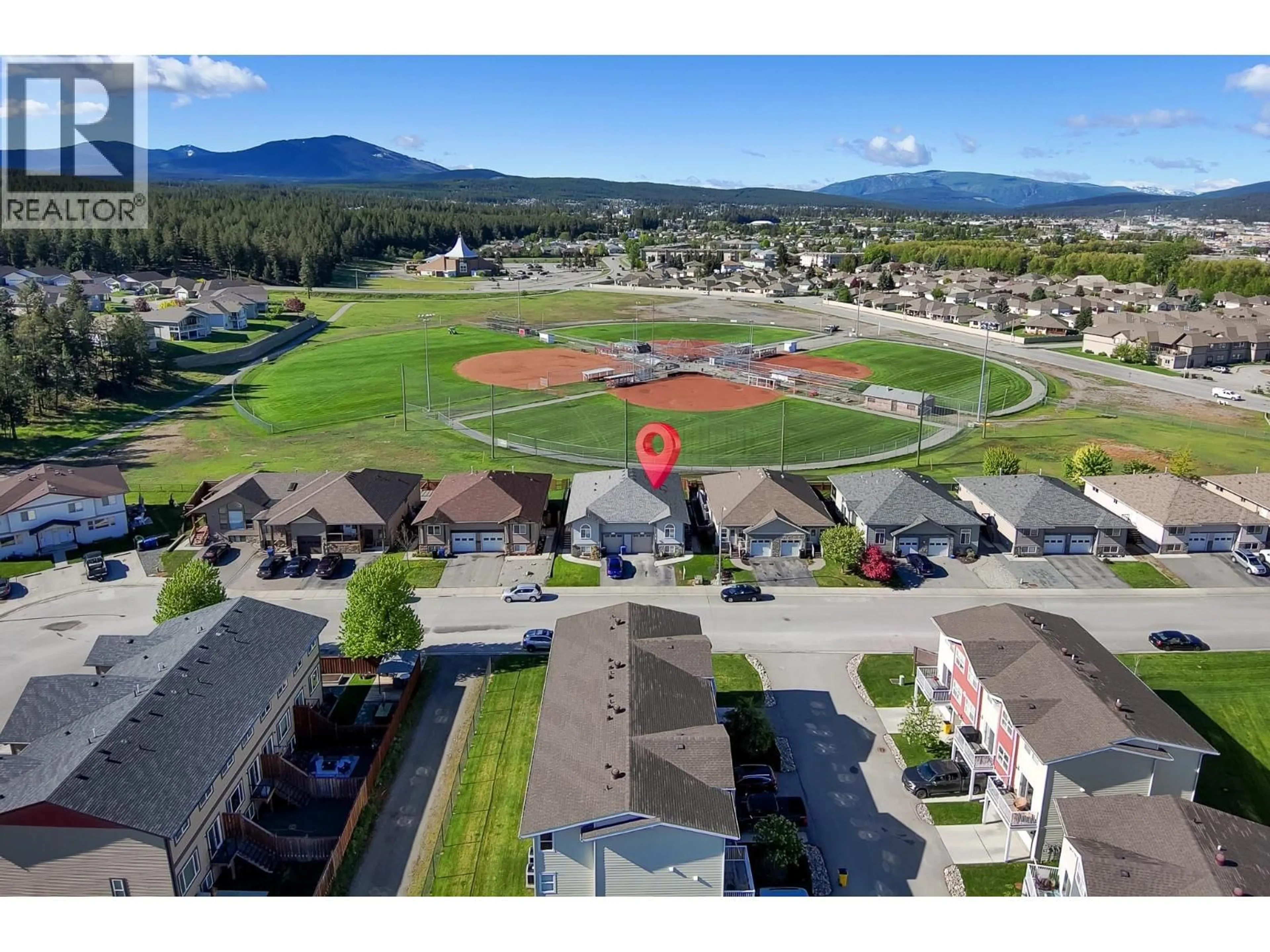 A pic from outside/outdoor area/front of a property/back of a property/a pic from drone, mountain view for A - 1849 KELOWNA CRESCENT, Cranbrook British Columbia V1C6L6