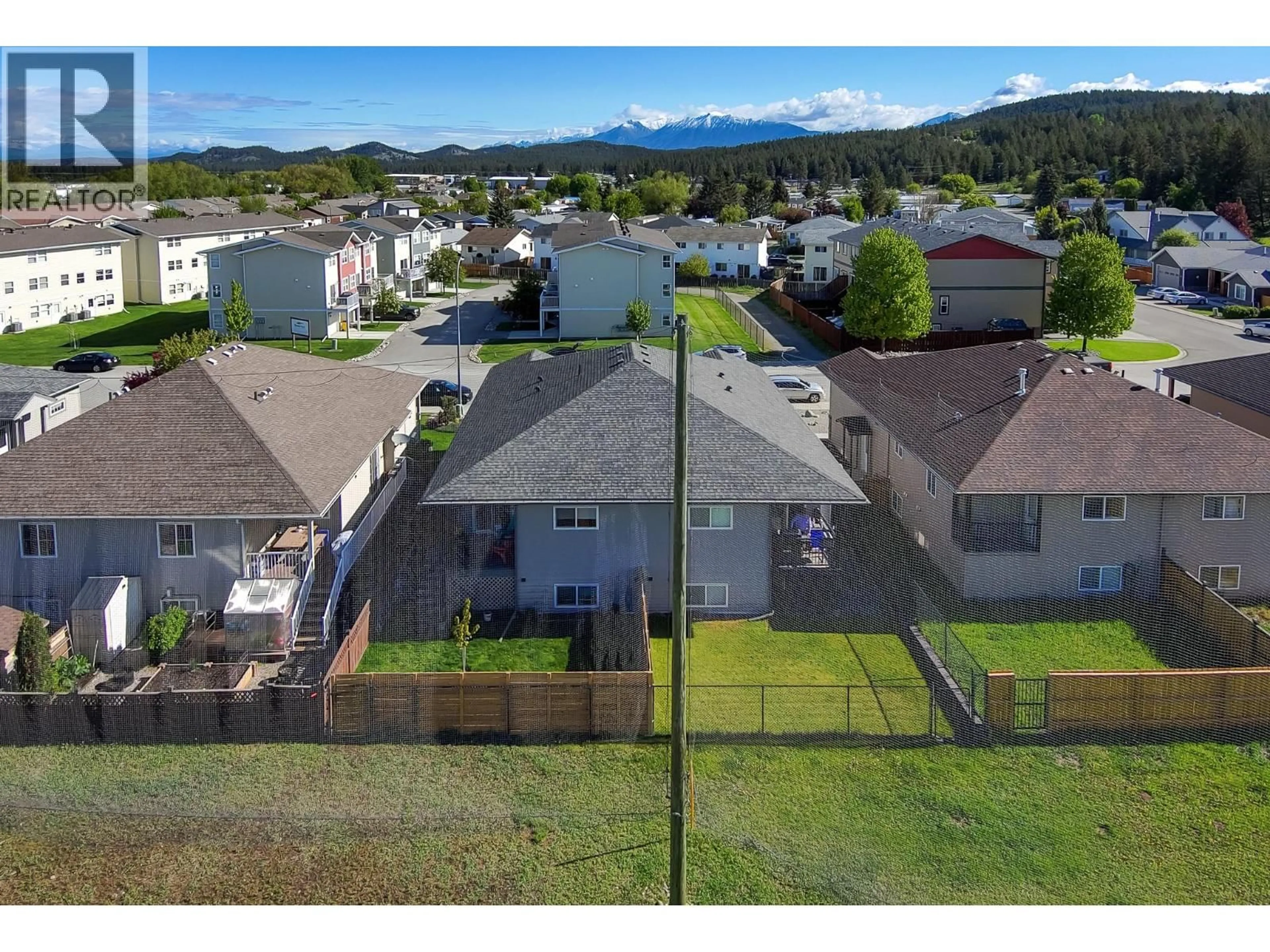 A pic from outside/outdoor area/front of a property/back of a property/a pic from drone, mountain view for A - 1849 KELOWNA CRESCENT, Cranbrook British Columbia V1C6L6