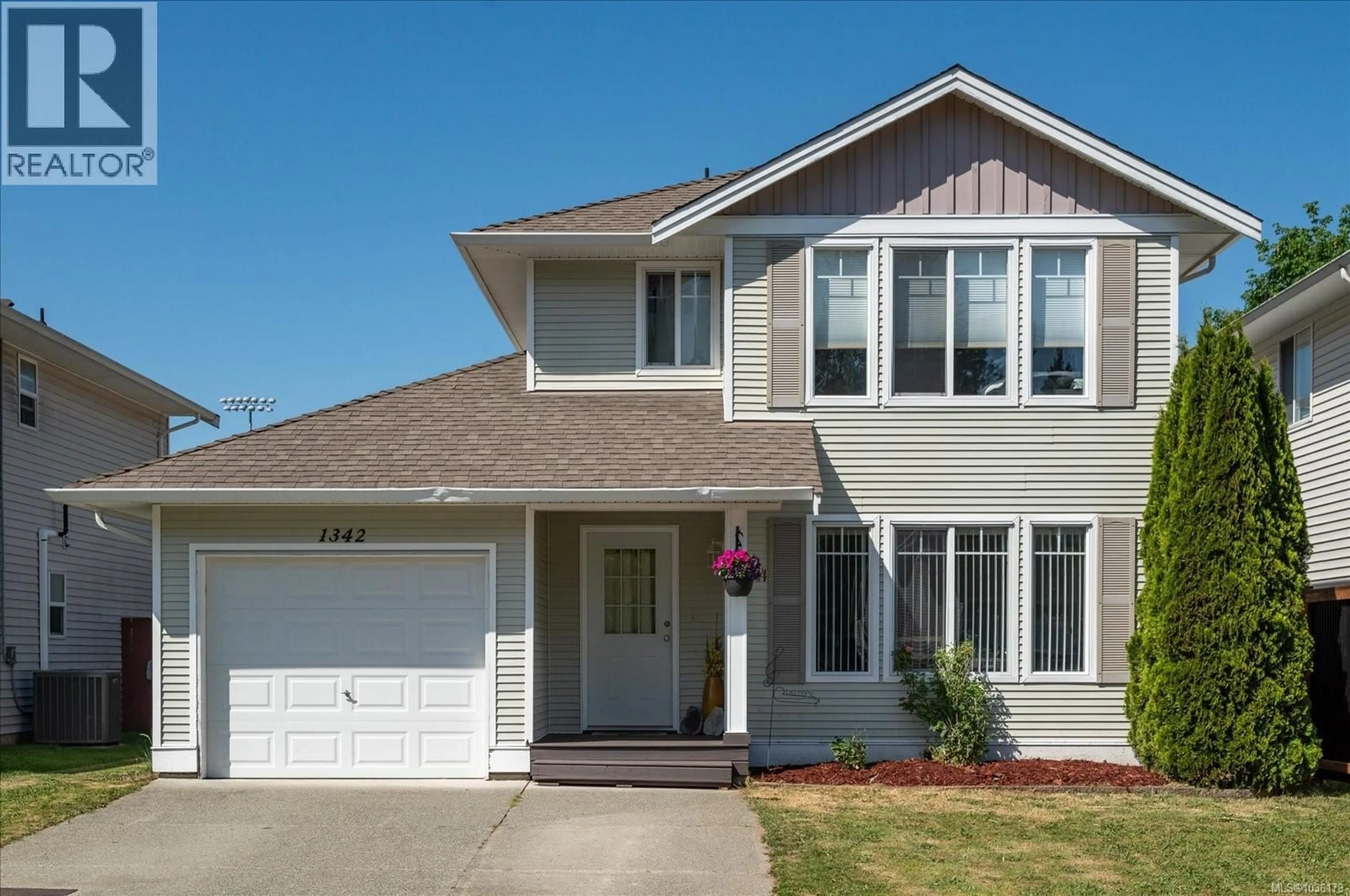 Home with vinyl exterior material, street for 1342 CEDARWOOD ROAD, Ladysmith British Columbia V9R1R4