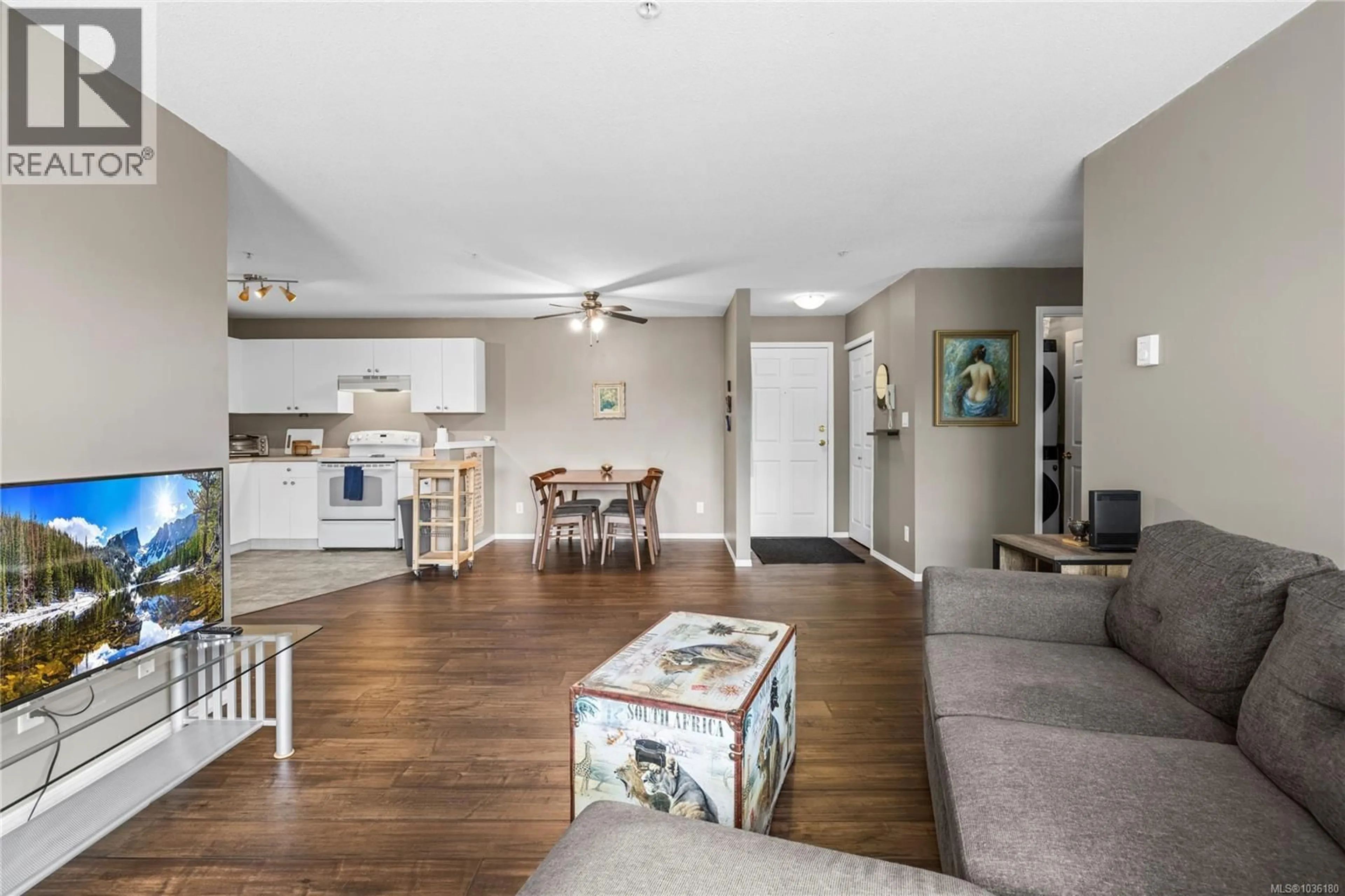 Living room with furniture, wood/laminate floor for 302 - 690 THIRD STREET, Nanaimo British Columbia V9R1W8