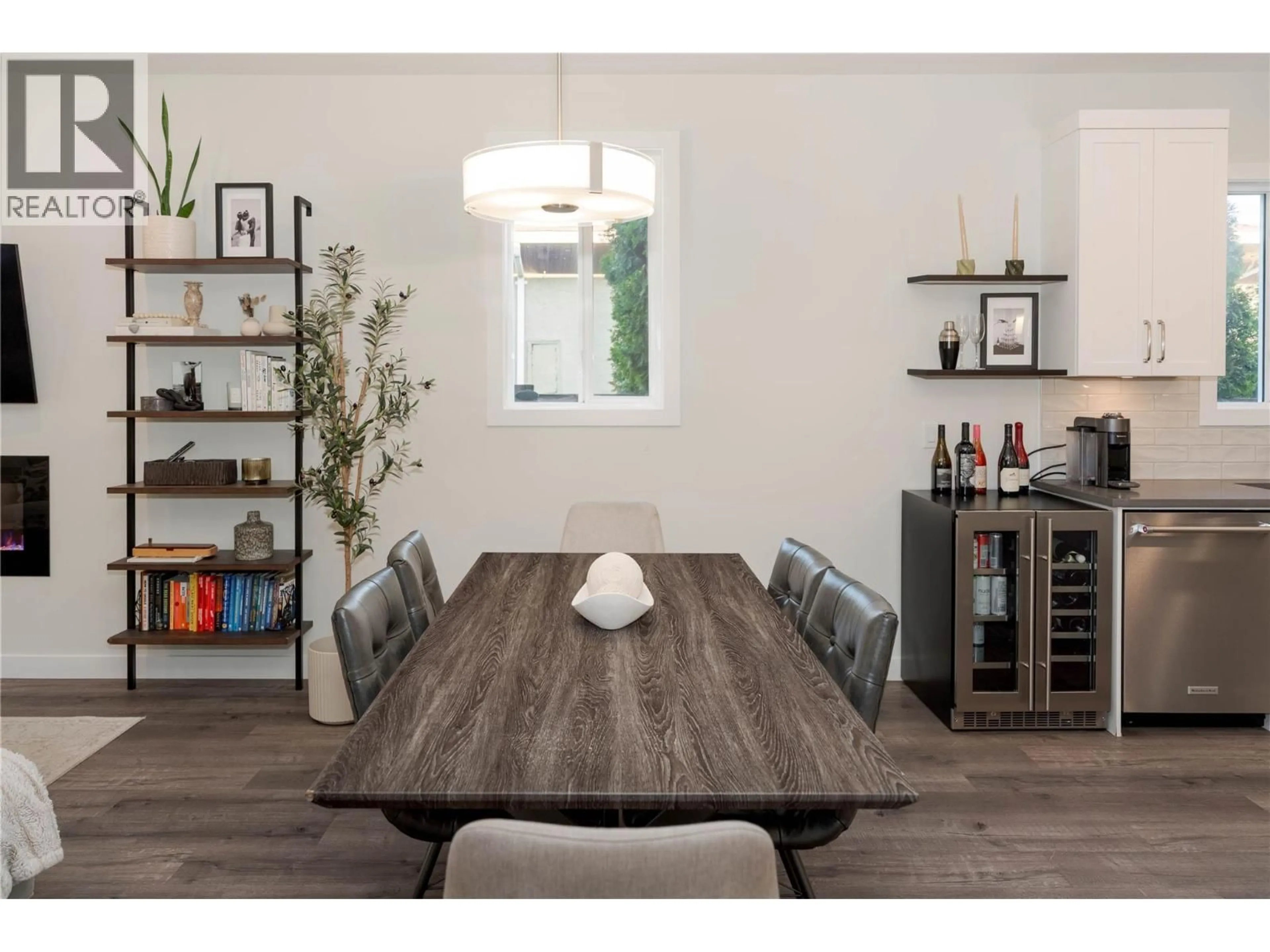 Dining room, wood/laminate floor for 1 - 1033 STOCKWELL AVENUE, Kelowna British Columbia V1Y6W4