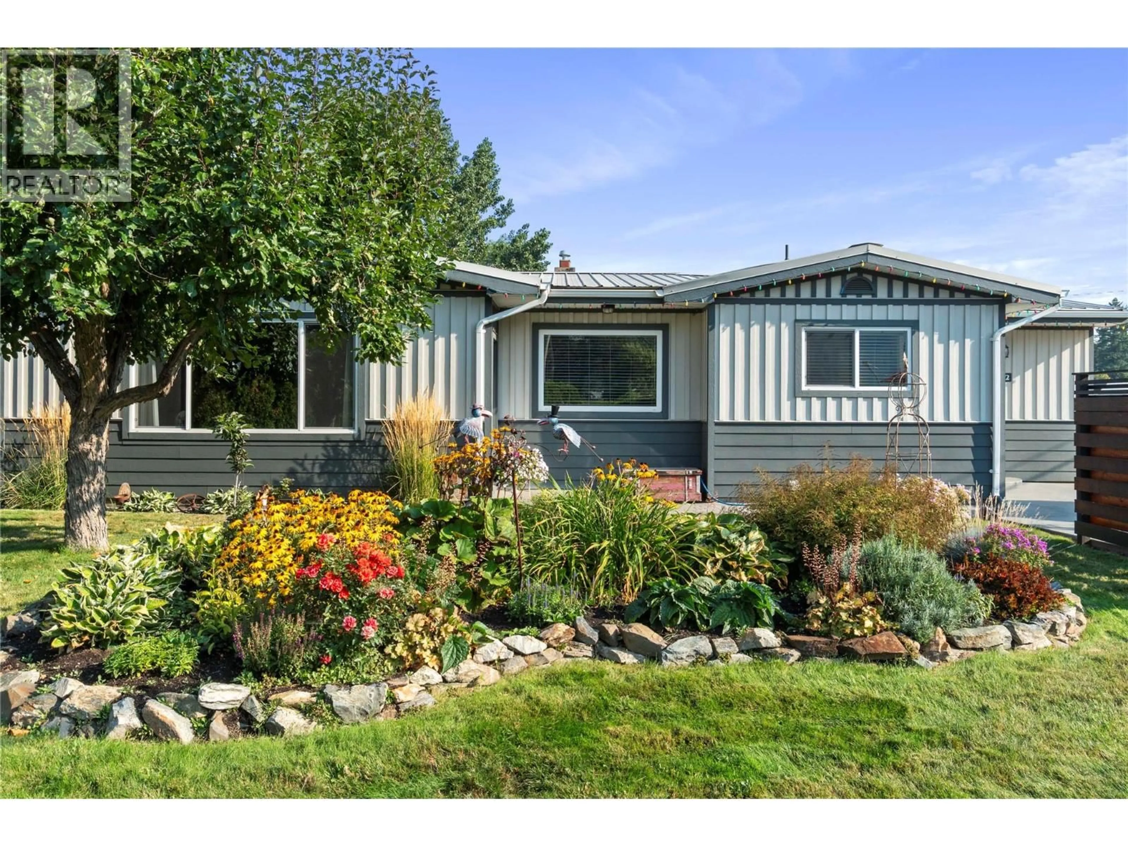 Home with vinyl exterior material, street for 702 SECOND AVENUE, Chase British Columbia V0E1M0