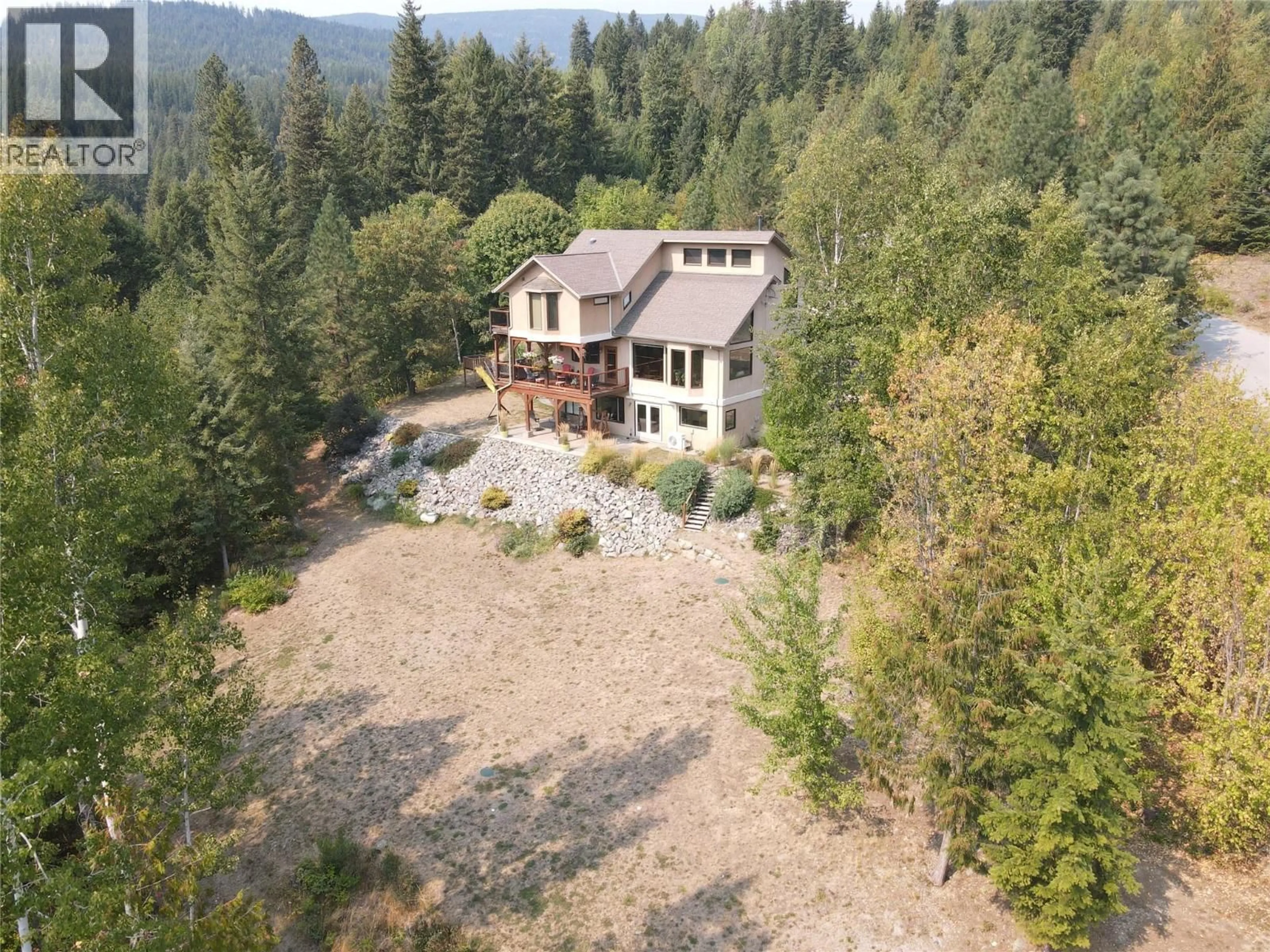 A pic from outside/outdoor area/front of a property/back of a property/a pic from drone, forest/trees view for 4510 BEASLEY WEST ROAD, Nelson British Columbia V0G2G0