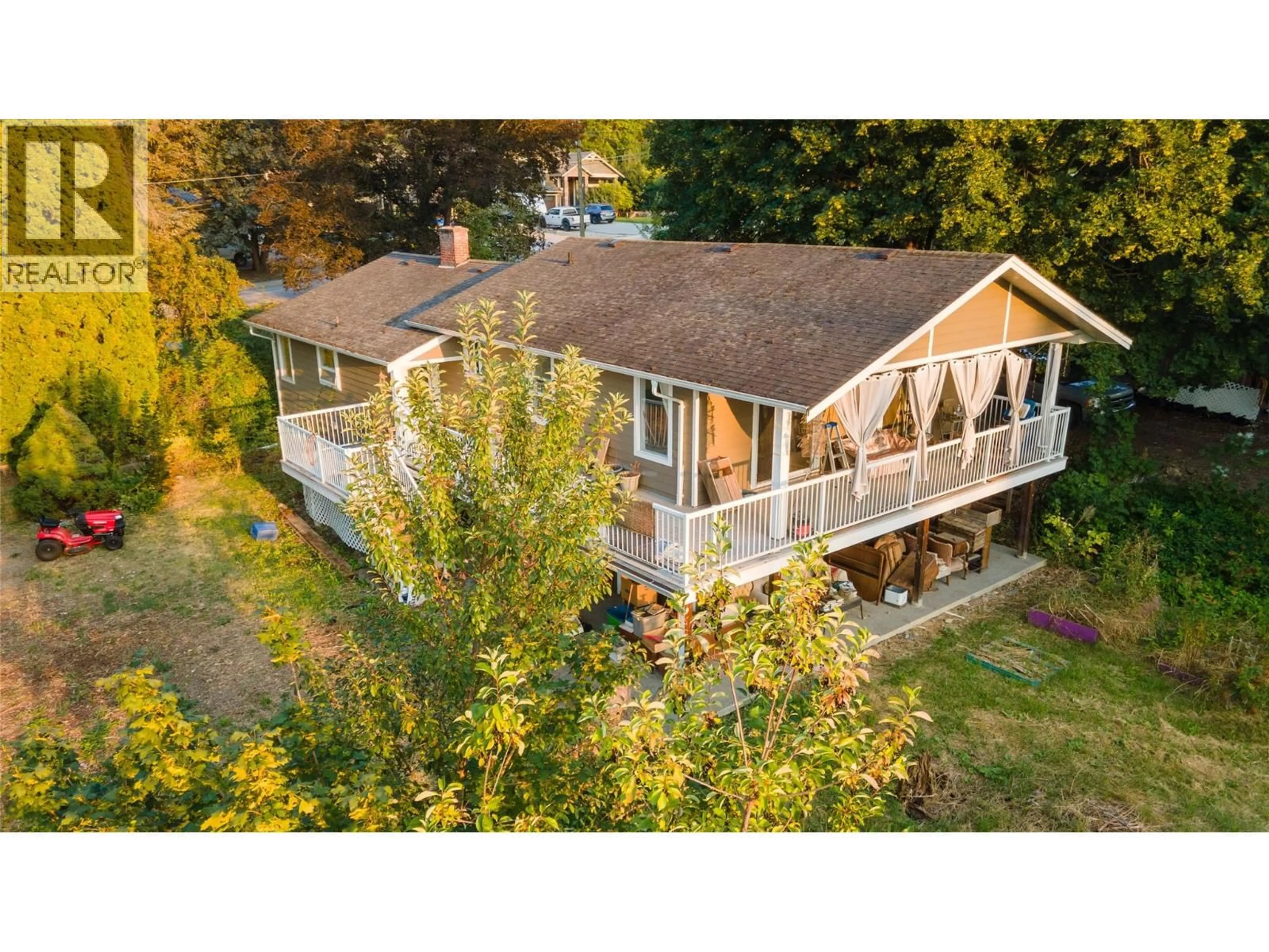 A pic from outside/outdoor area/front of a property/back of a property/a pic from drone, water/lake/river/ocean view for 1121 SHUSWAP STREET SOUTHWEST, Salmon Arm British Columbia V1E1J3