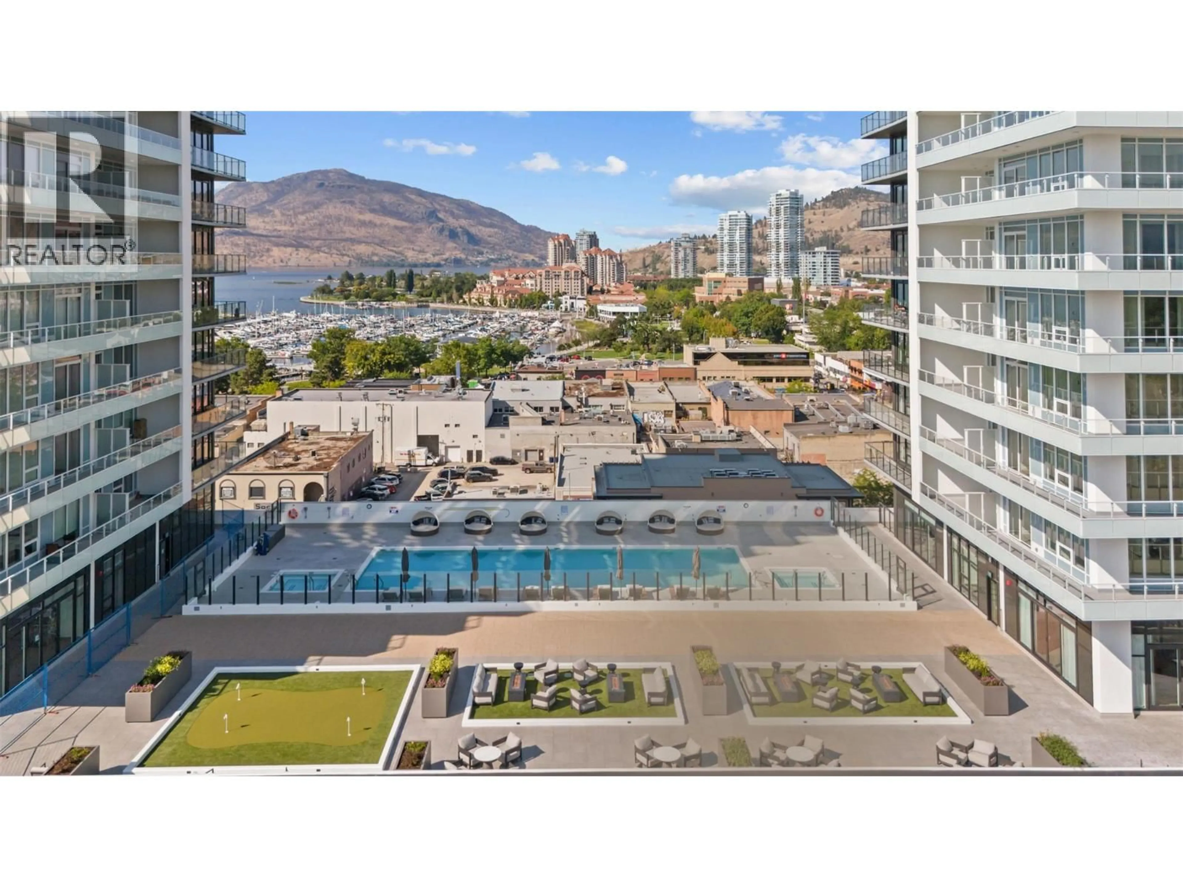 Patio, city buildings view from balcony for 1503 - 238 LEON AVENUE, Kelowna British Columbia V1Y6H9
