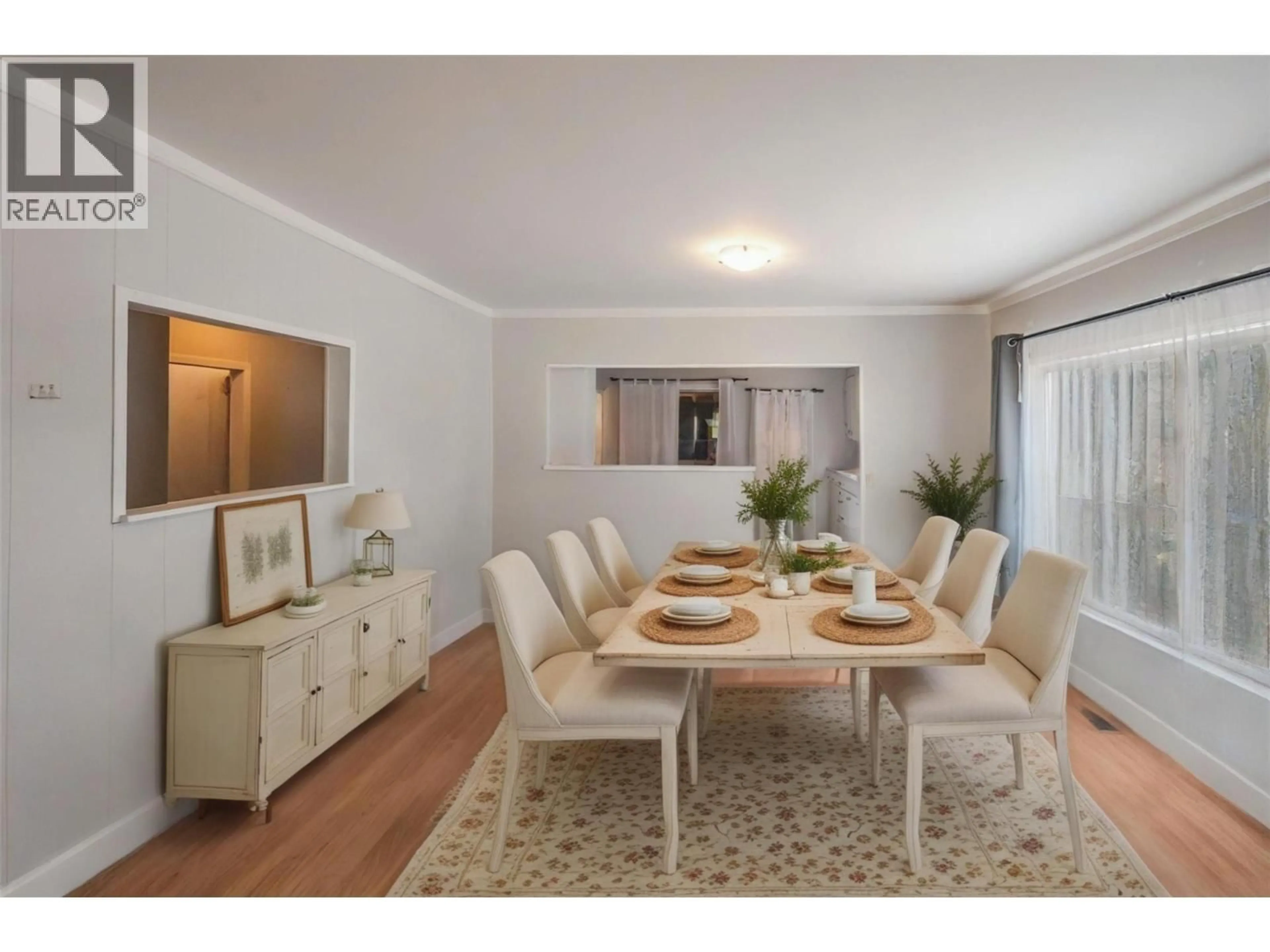 Dining room, wood/laminate floor for 6487 BADGER STREET, Oliver British Columbia V0H1T3