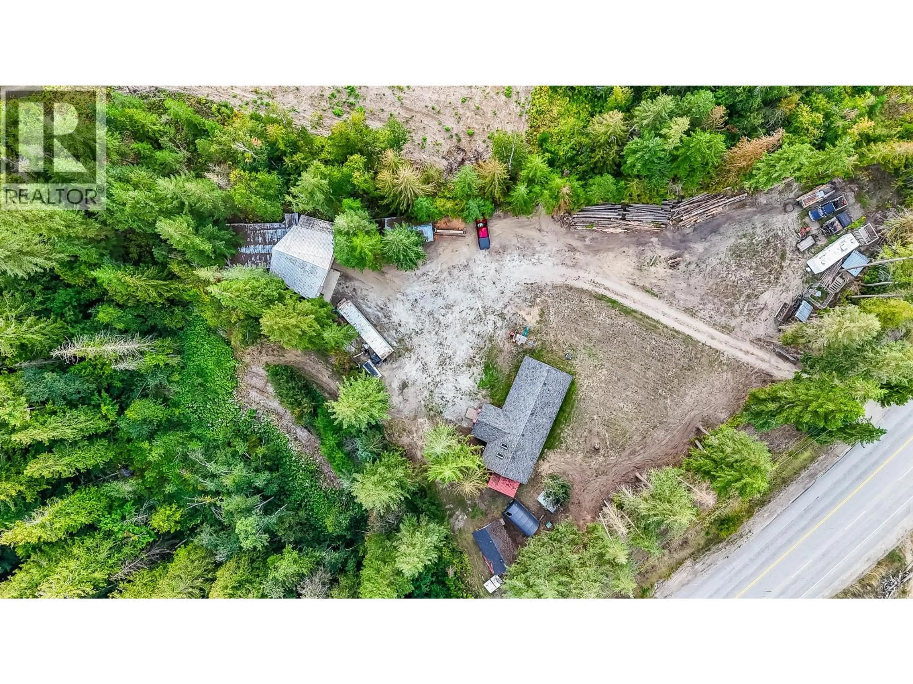 A pic from outside/outdoor area/front of a property/back of a property/a pic from drone, forest/trees view for 174 BC-97B OTHER, Enderby British Columbia V4Y4H4
