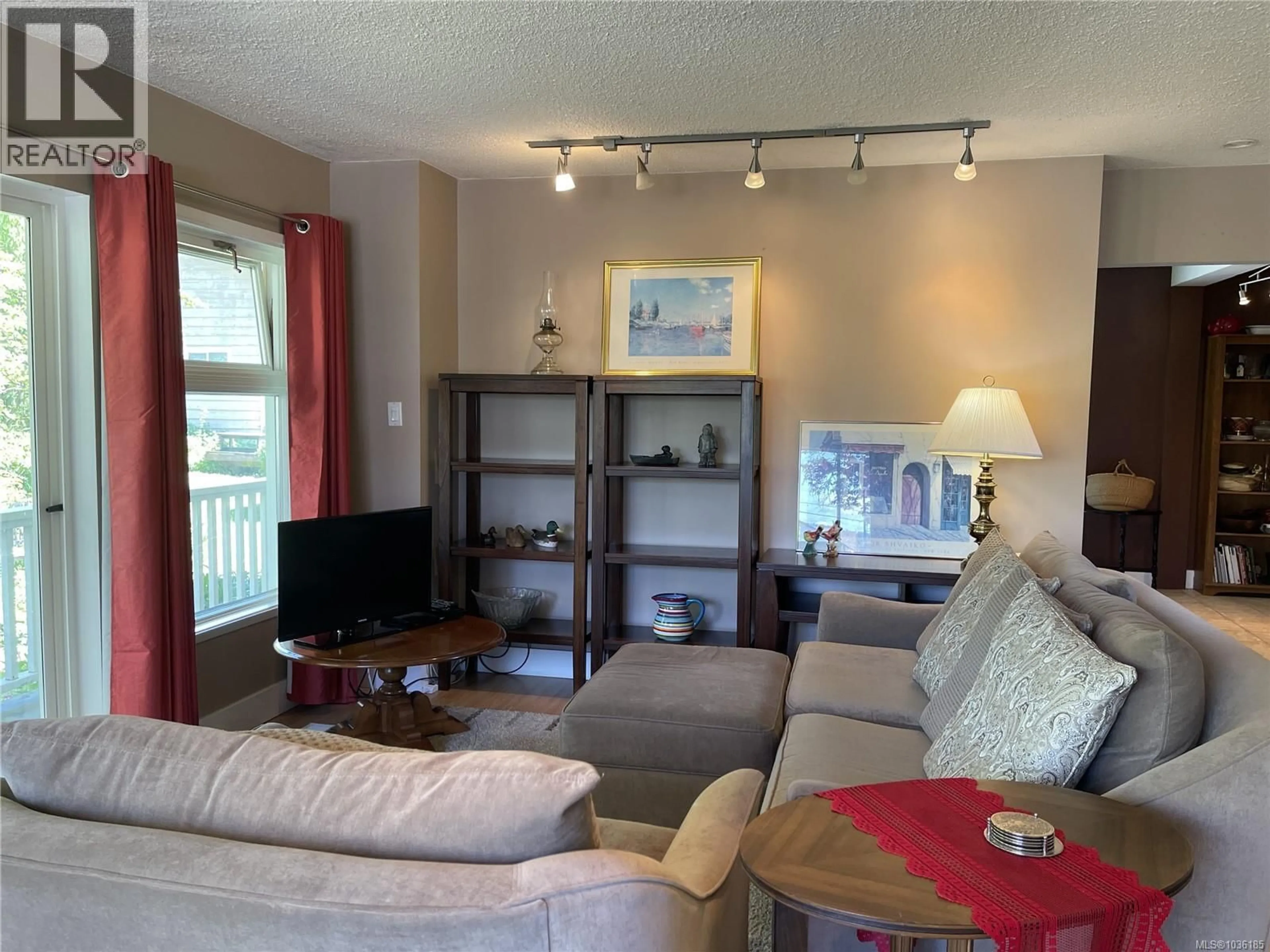 Living room with furniture, wood/laminate floor for 2821 4TH AVENUE, Port Alberni British Columbia V9Y2C2