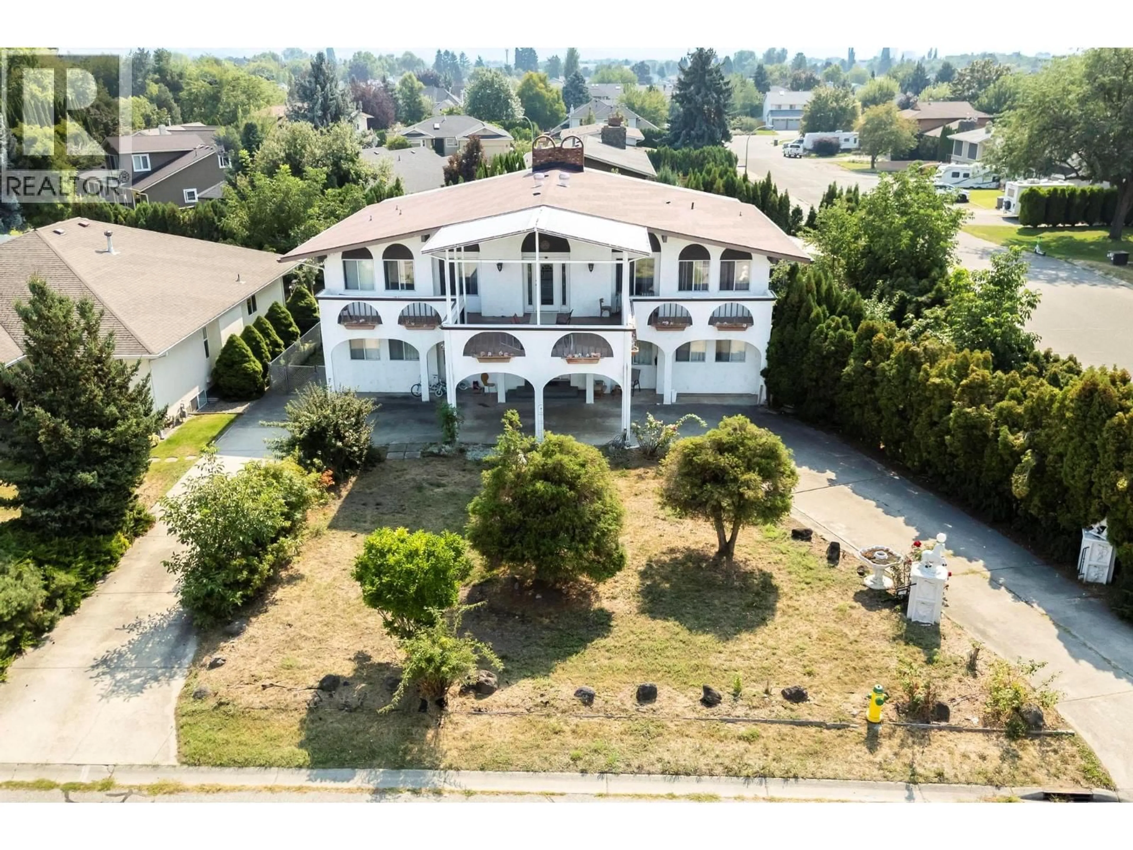 A pic from outside/outdoor area/front of a property/back of a property/a pic from drone, building for 2295 RHONDDA COURT, Kelowna British Columbia V1Y7Y2