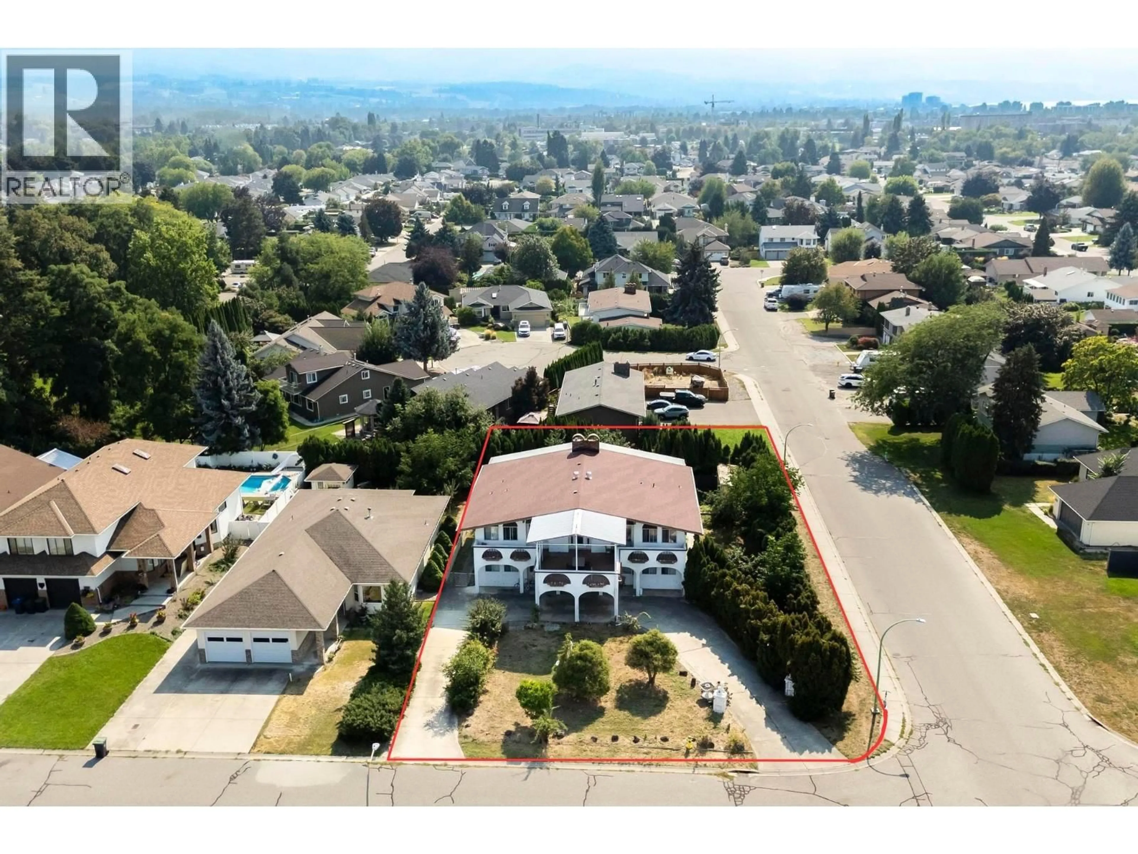 A pic from outside/outdoor area/front of a property/back of a property/a pic from drone, mountain view for 2295 RHONDDA COURT, Kelowna British Columbia V1Y7Y2