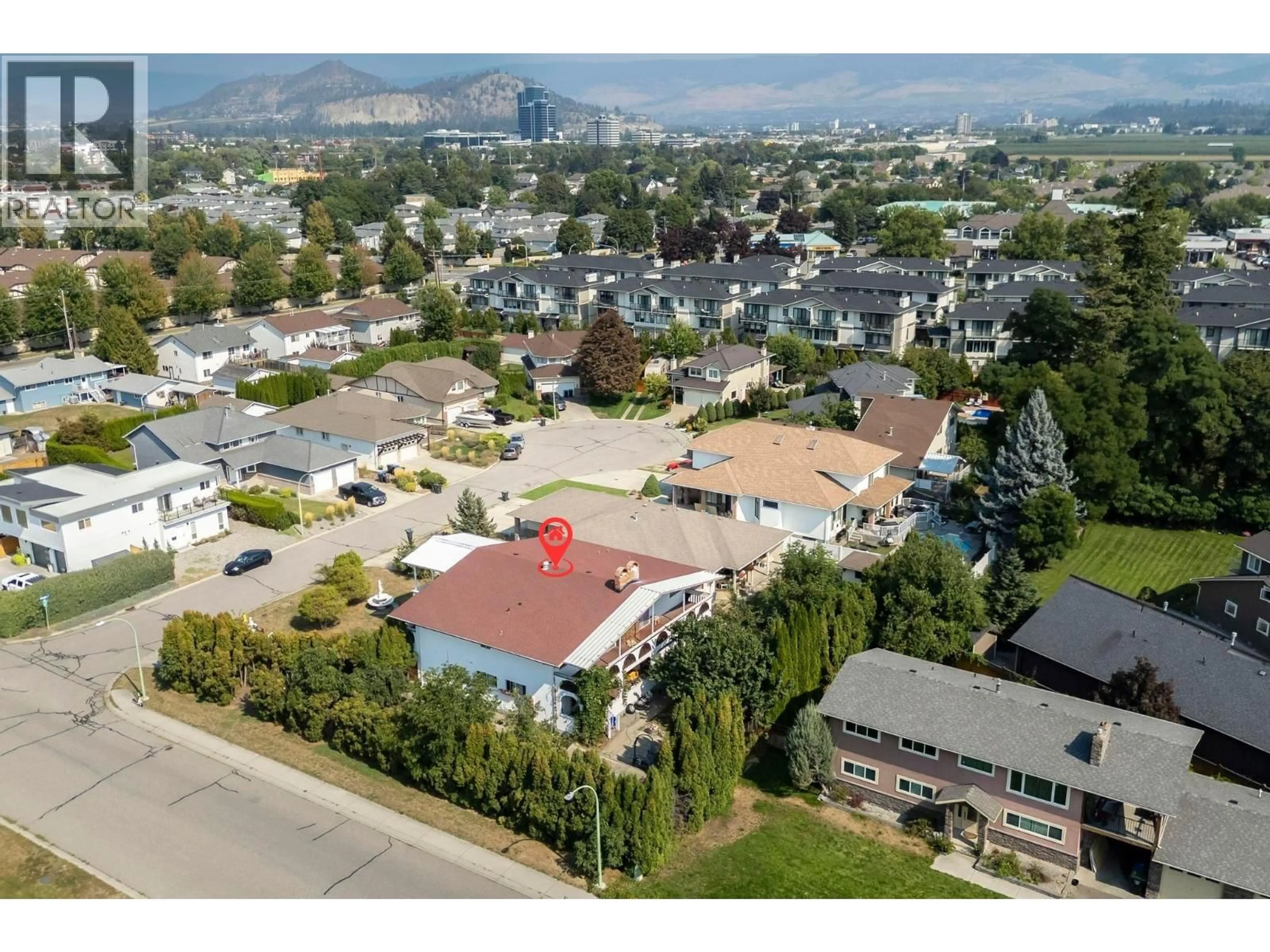 A pic from outside/outdoor area/front of a property/back of a property/a pic from drone, mountain view for 2295 RHONDDA COURT, Kelowna British Columbia V1Y7Y2