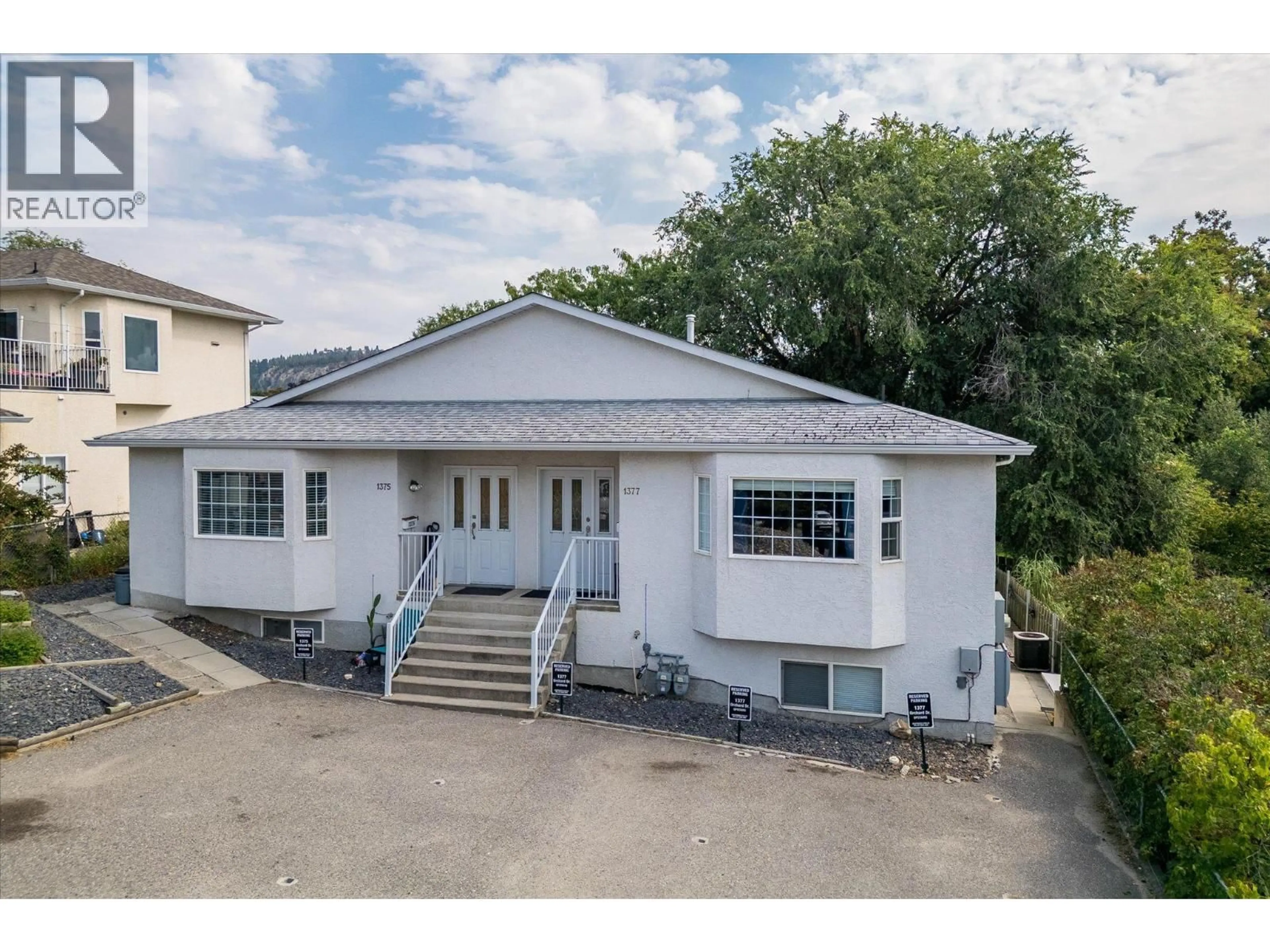 A pic from outside/outdoor area/front of a property/back of a property/a pic from drone, building for 1375/1377 ORCHARD DRIVE, Kelowna British Columbia V1Y3V1