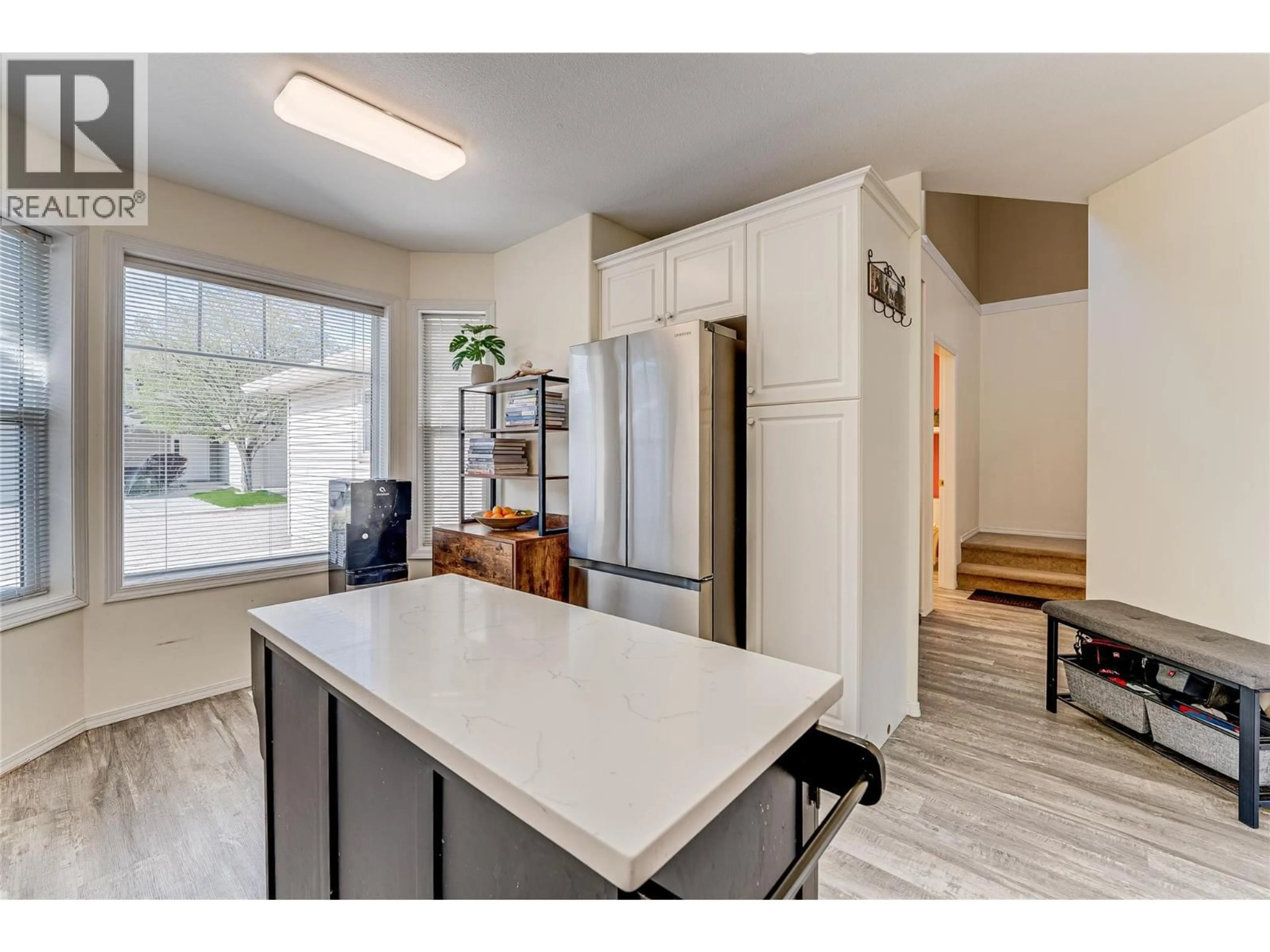 Open concept kitchen, ceramic/tile floor for 5 - 5886 OKANAGAN LANDING ROAD, Vernon British Columbia V1H1S1