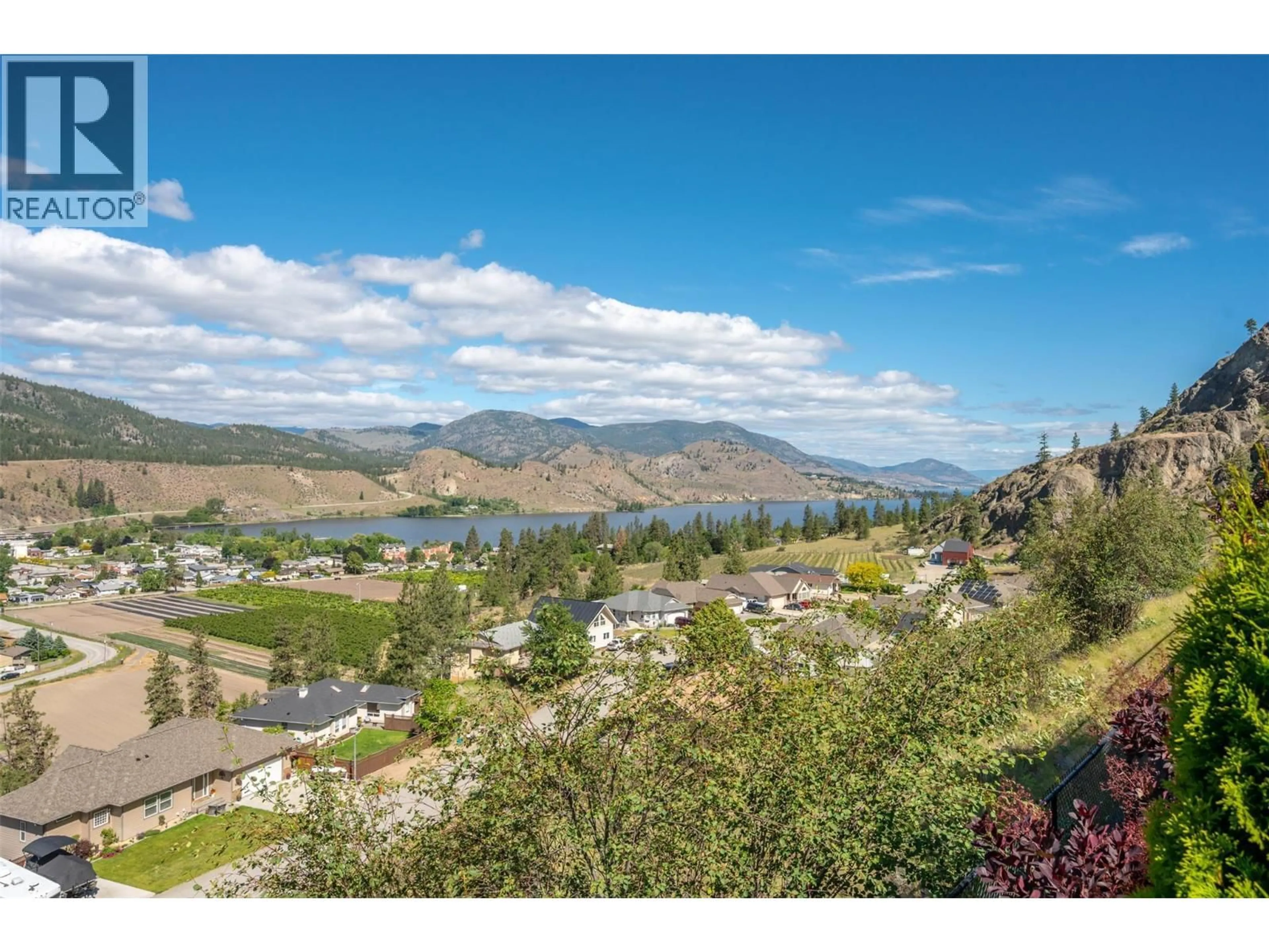 A pic from outside/outdoor area/front of a property/back of a property/a pic from drone, water/lake/river/ocean view for 137 - 4400 MCLEAN CREEK ROAD, Okanagan Falls British Columbia V0H1R6