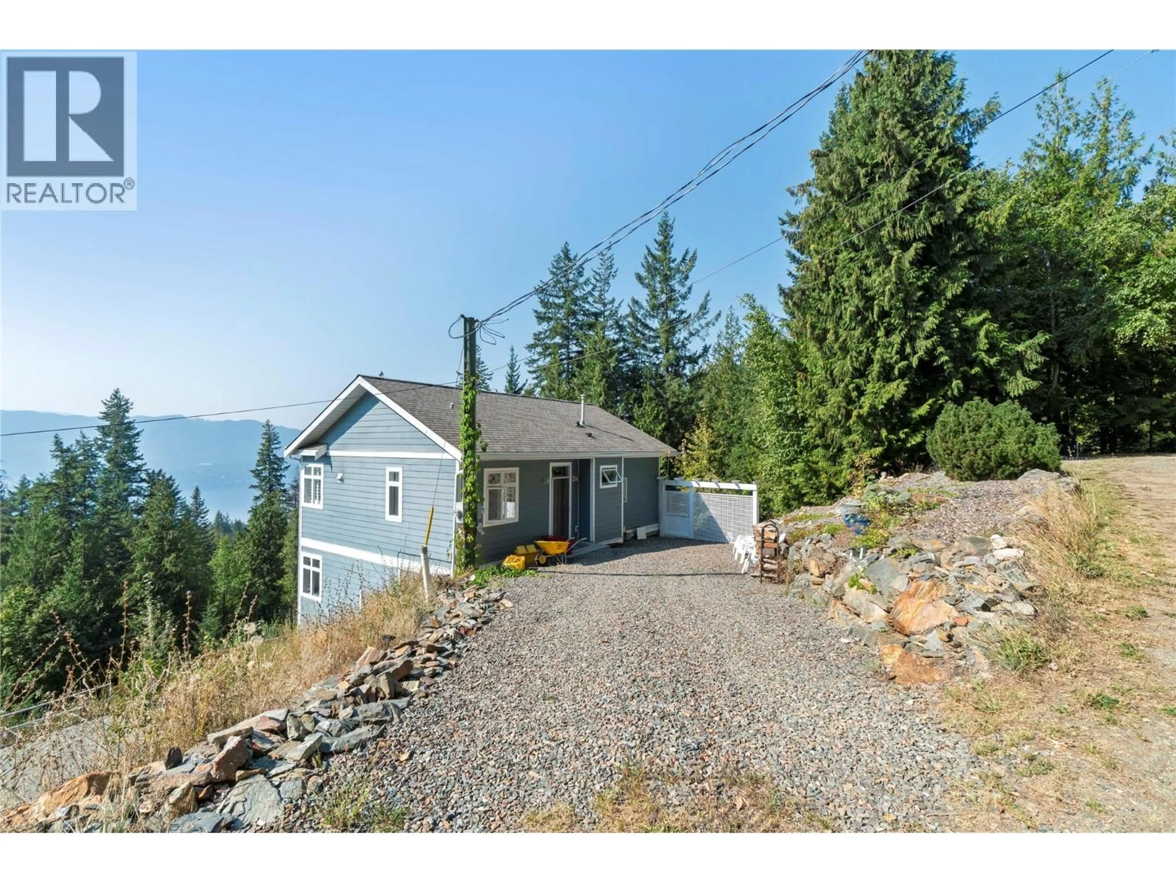 A pic from outside/outdoor area/front of a property/back of a property/a pic from drone, water/lake/river/ocean view for 7660 LICHEN ROAD, Anglemont British Columbia V0E1M8
