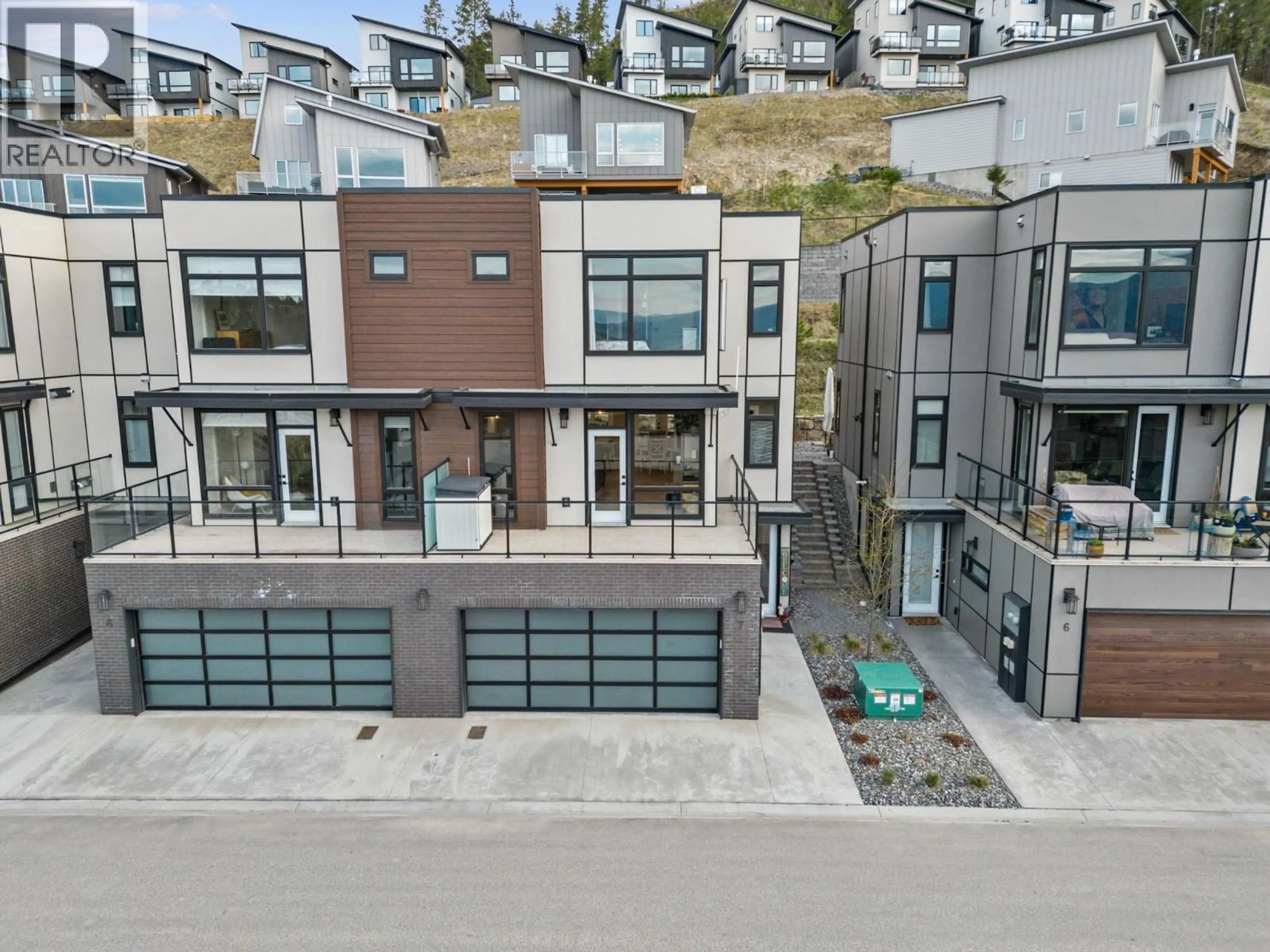 A pic from outside/outdoor area/front of a property/back of a property/a pic from drone, street for 7 - 3220 HILLTOWN DRIVE, Kelowna British Columbia V1V0C6