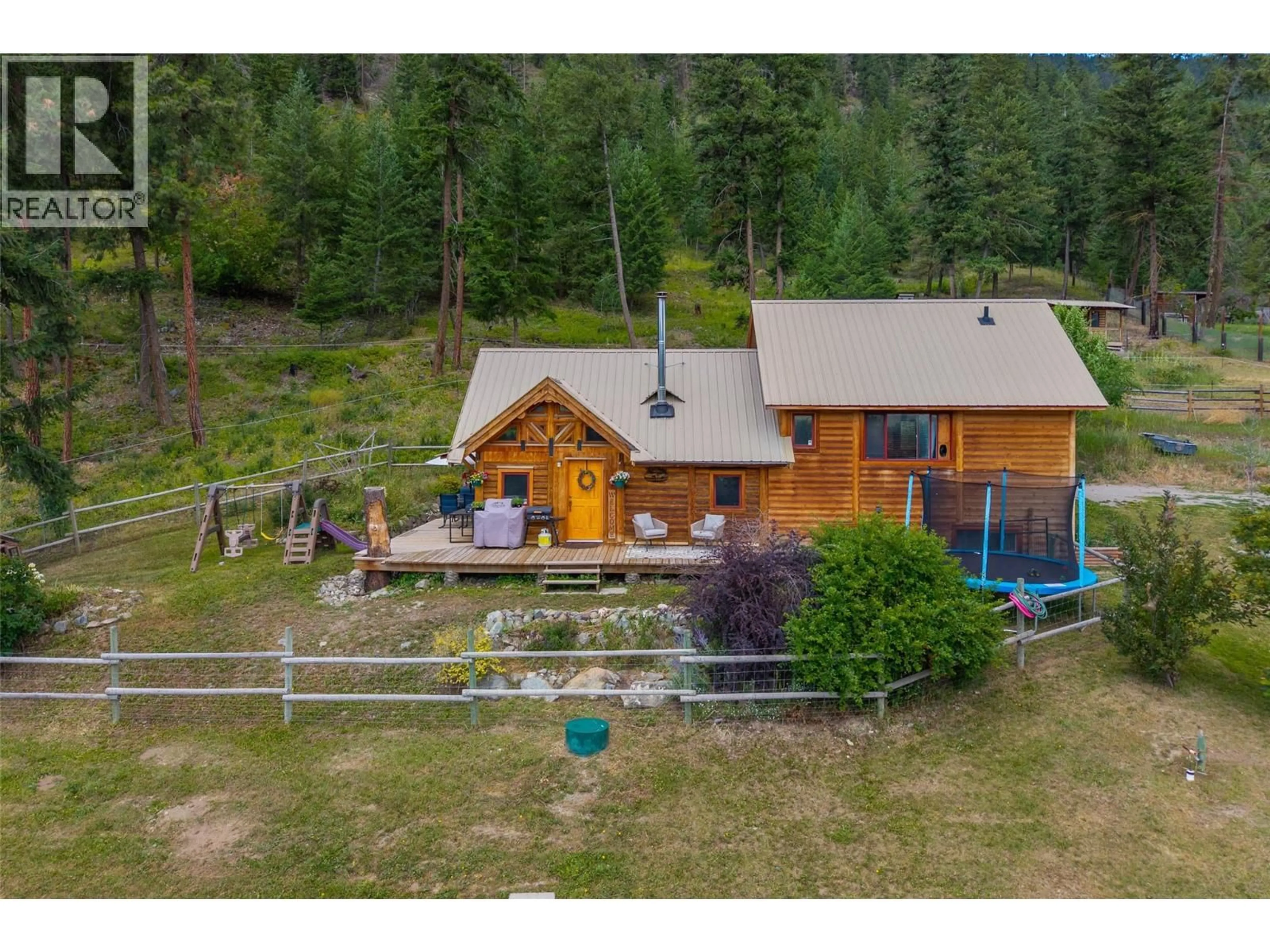 A pic from outside/outdoor area/front of a property/back of a property/a pic from drone, mountain view for 8585 WESTSYDE ROAD, Kamloops British Columbia V2B8S3