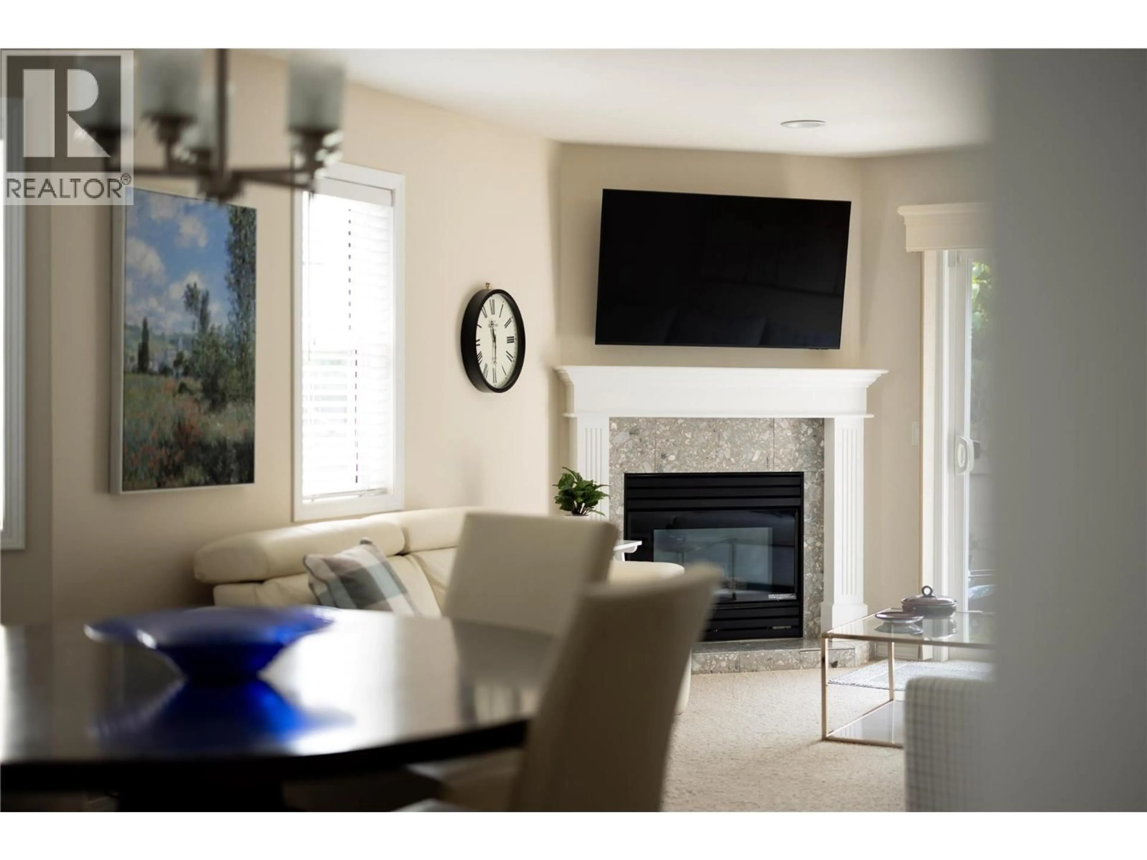 Living room with furniture, ceramic/tile floor for 7 - 535 GLENMEADOWS ROAD, Kelowna British Columbia V1V1X7