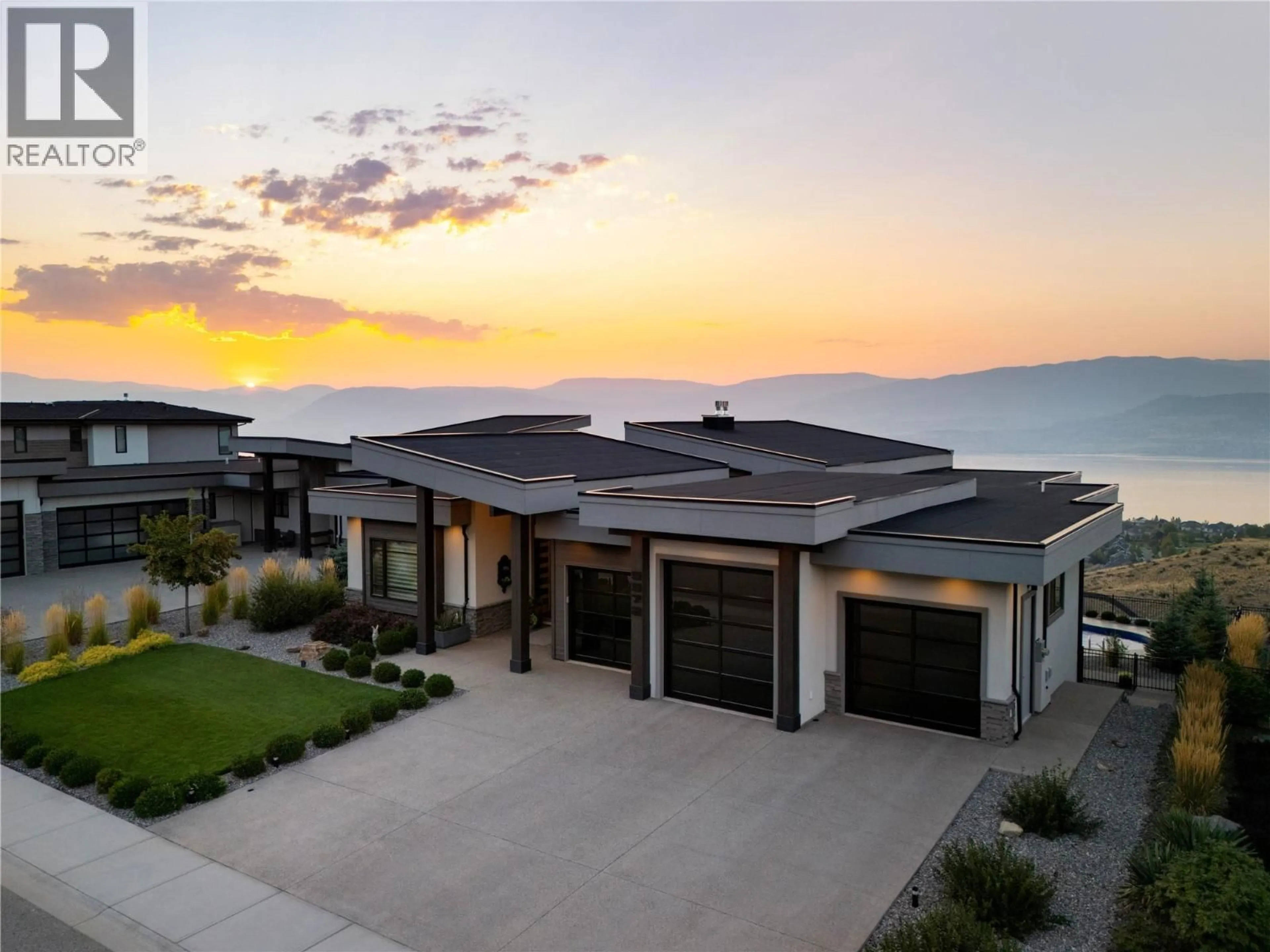 A pic from outside/outdoor area/front of a property/back of a property/a pic from drone, mountain view for 5572 UPPER MISSION DRIVE, Kelowna British Columbia V1W5M4