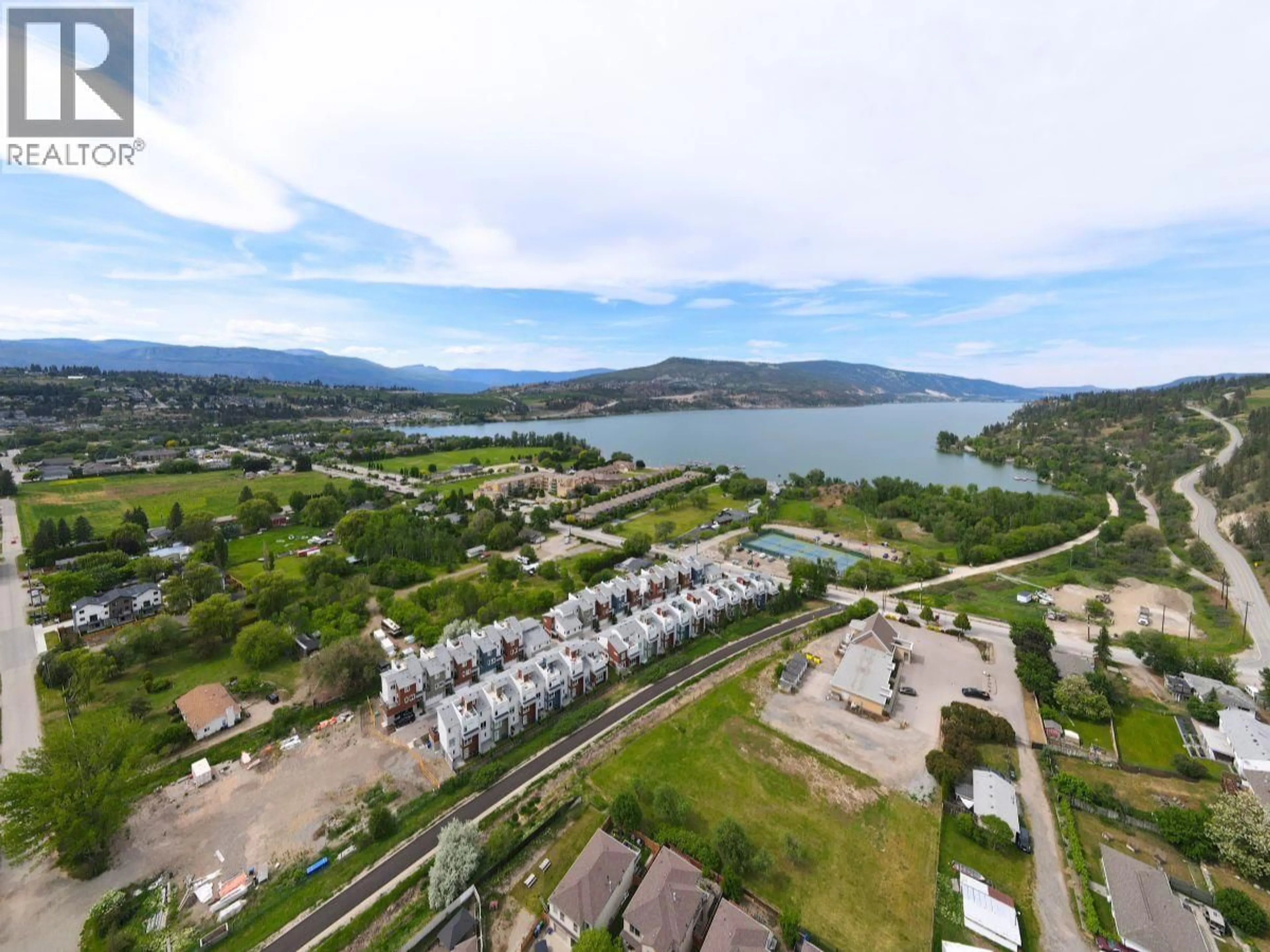A pic from outside/outdoor area/front of a property/back of a property/a pic from drone, water/lake/river/ocean view for 13 - 11392 LODGE ROAD, Lake Country British Columbia V4V1X2