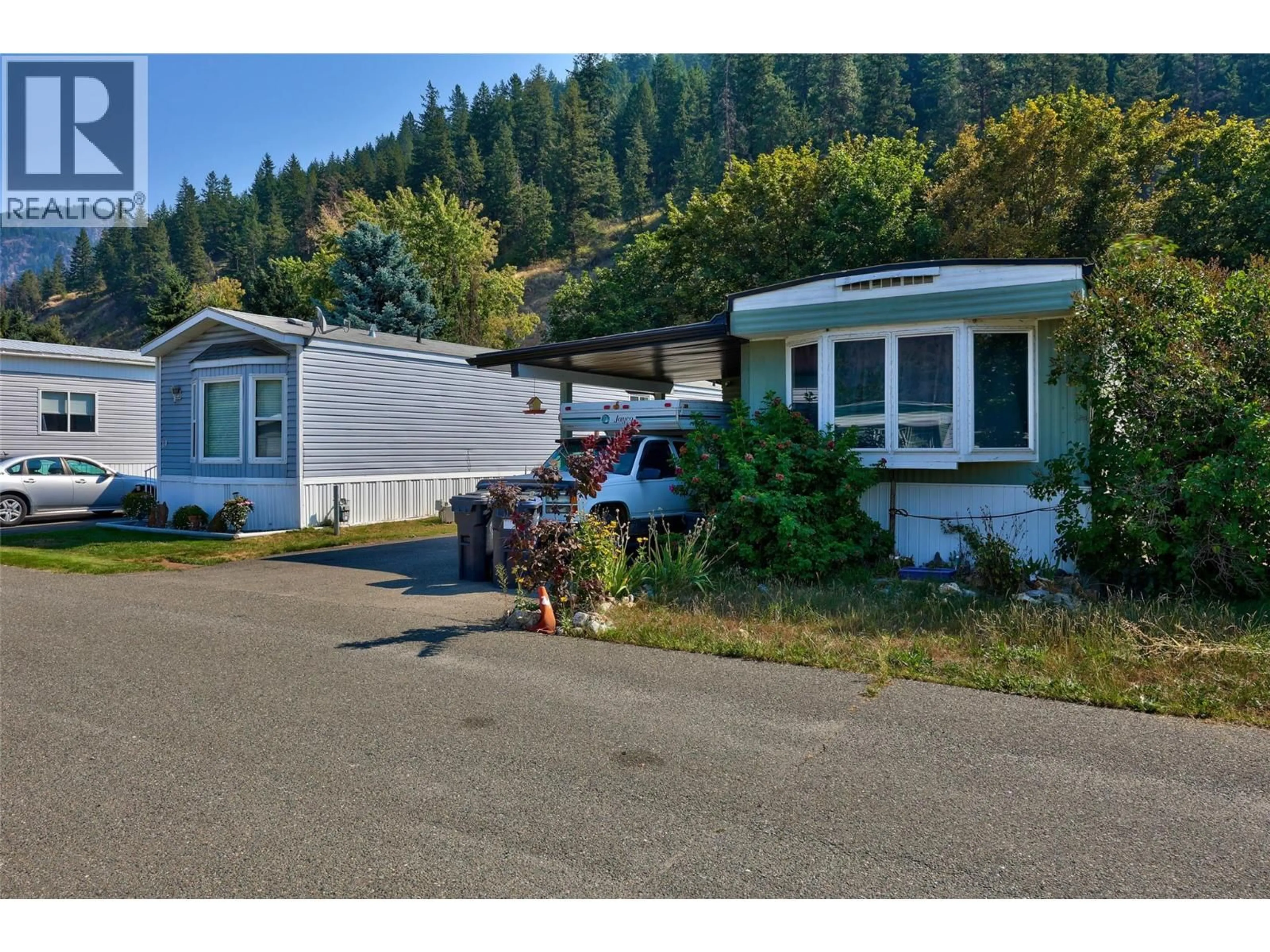 Home with vinyl exterior material, street for 13 - 161 SHUSWAP AVENUE, Chase British Columbia V0E1M0