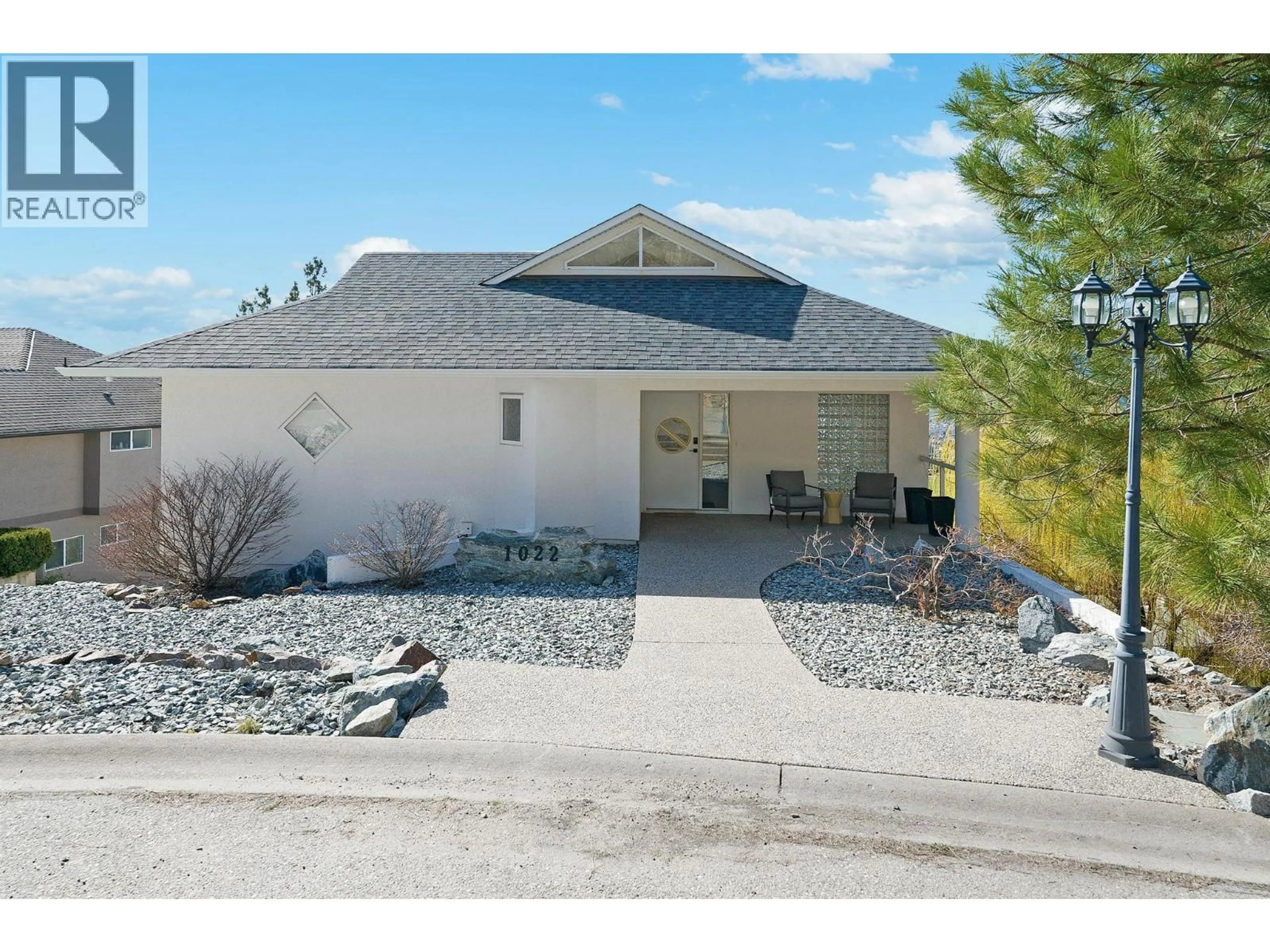 Home with vinyl exterior material, street for 1022 JAMES HOCKEY PLACE, Kelowna British Columbia V1X7L2