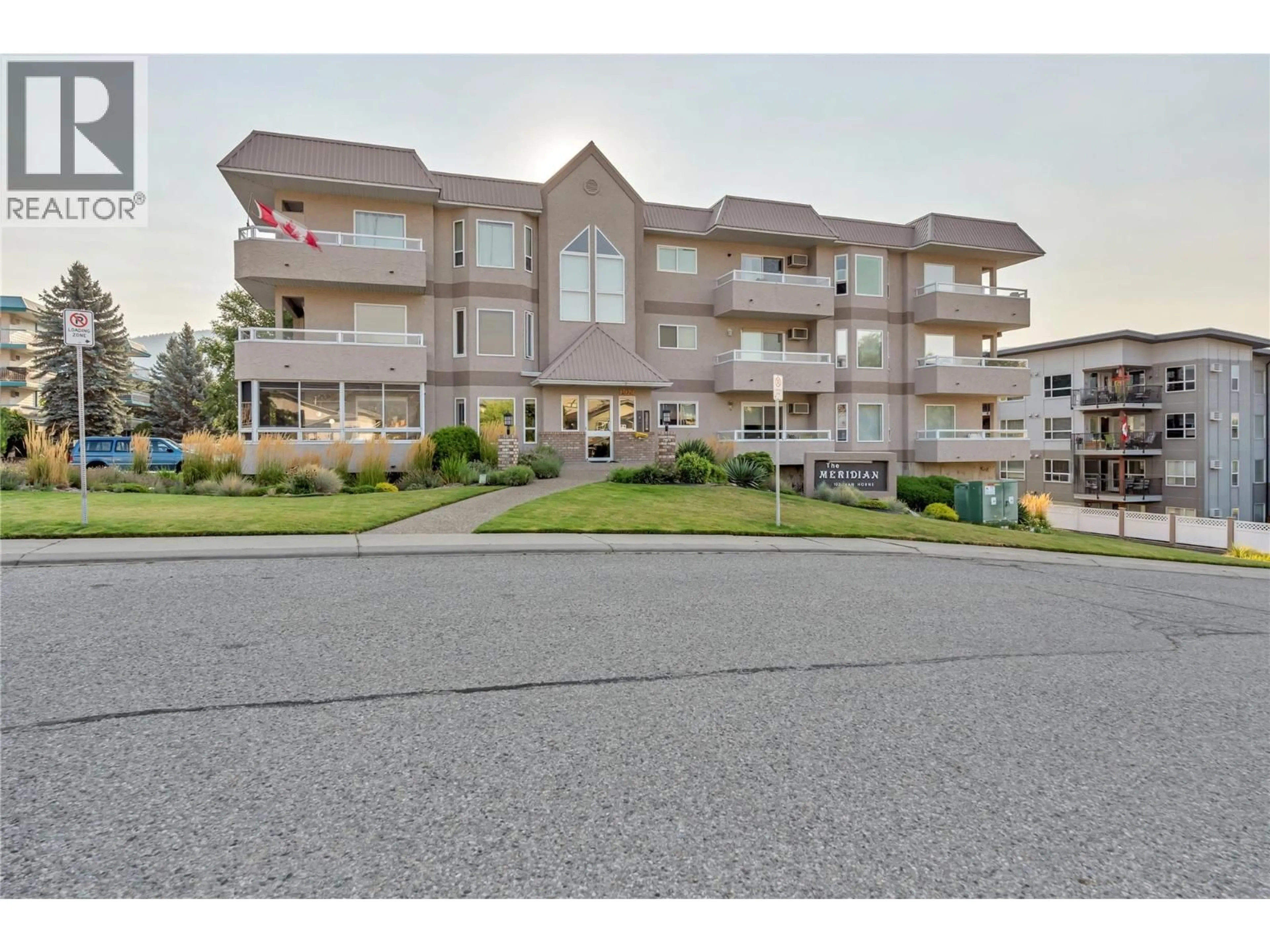 A pic from outside/outdoor area/front of a property/back of a property/a pic from drone, unknown for 305 - 102 VAN HORNE STREET, Penticton British Columbia V2A4K2