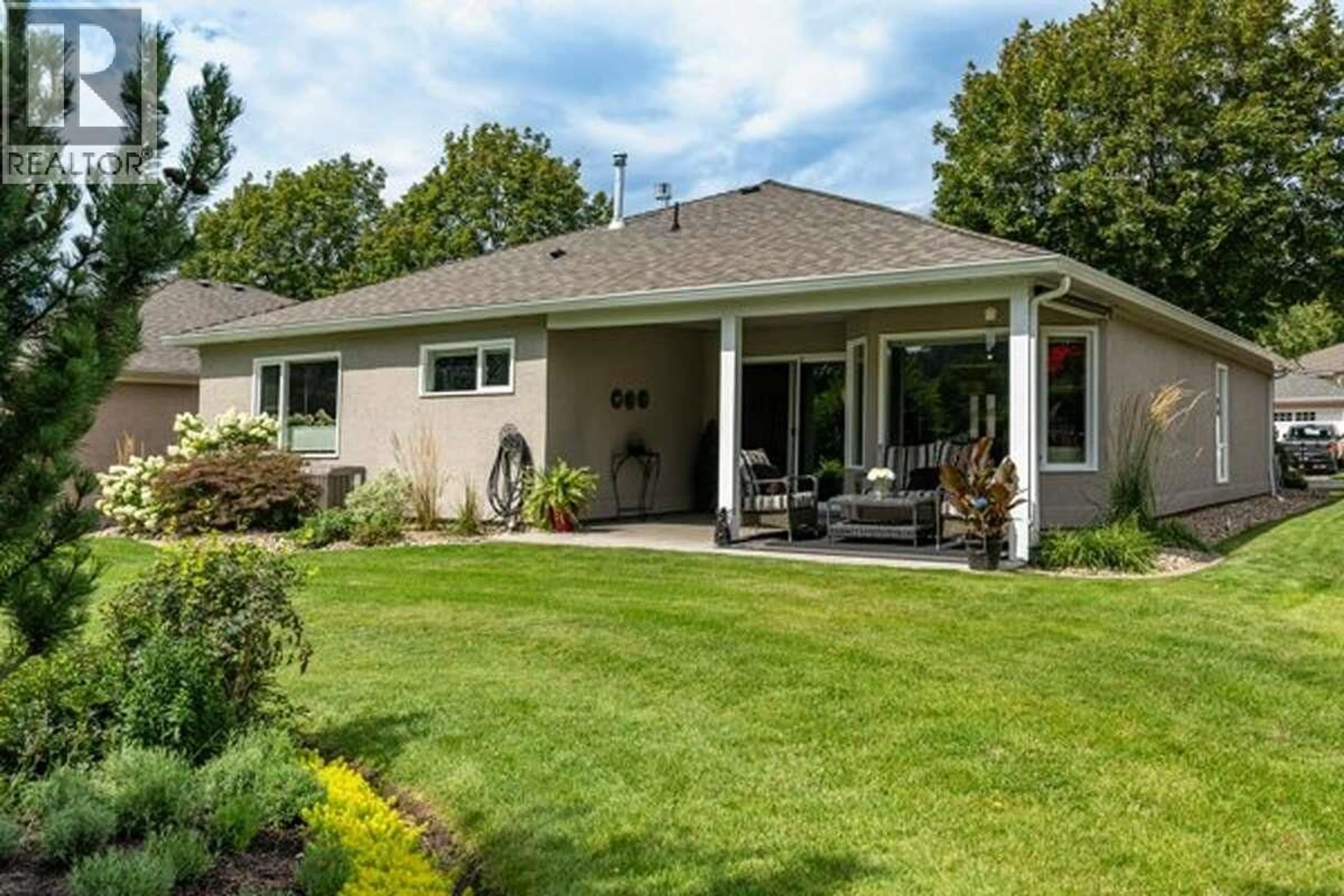 Home with vinyl exterior material, unknown for 98 - 615 GLENMEADOWS ROAD, Kelowna British Columbia V1V1N9