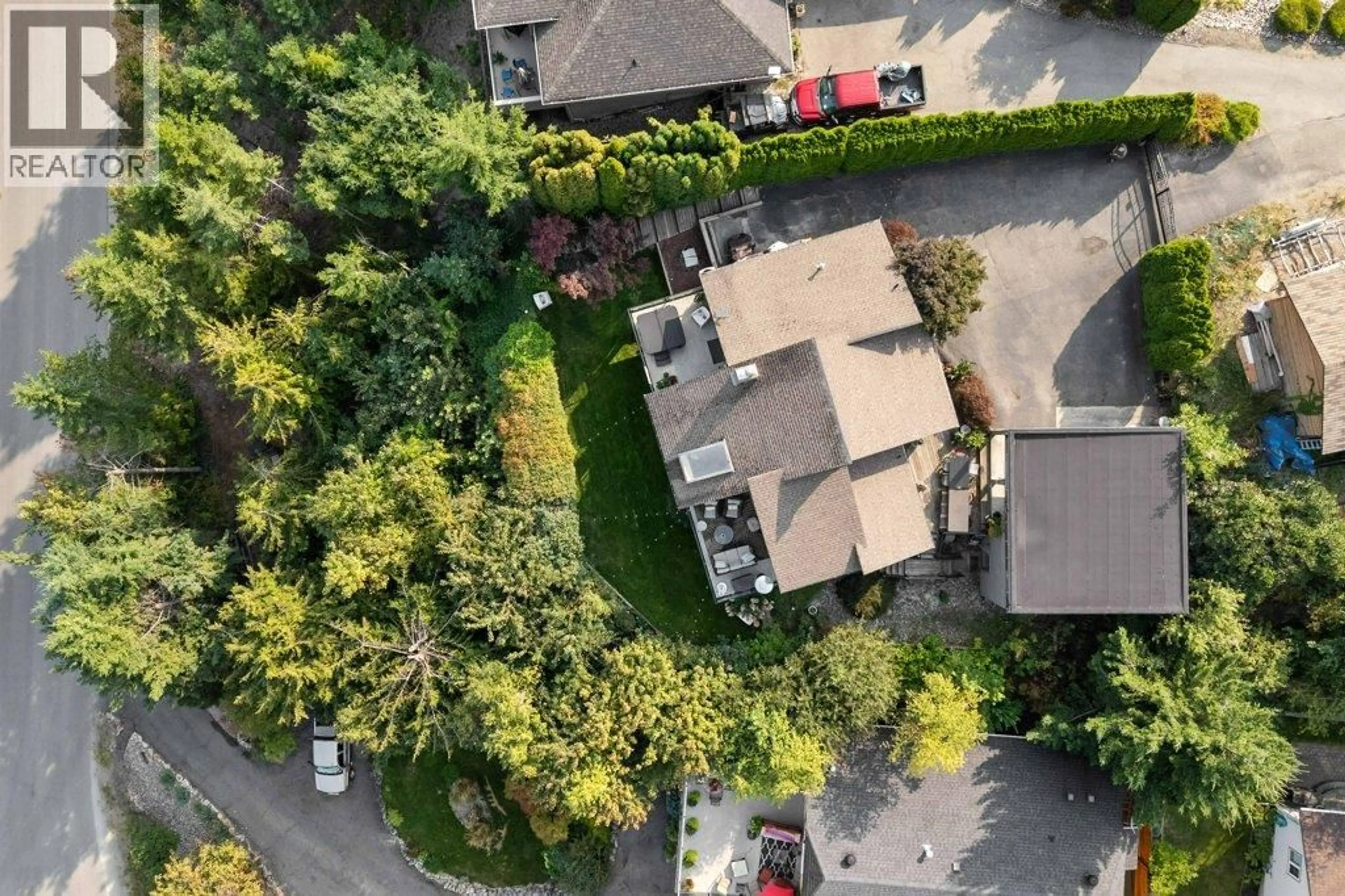 A pic from outside/outdoor area/front of a property/back of a property/a pic from drone, street for 2221 SUNSET POINT, Blind Bay British Columbia V0E2W2
