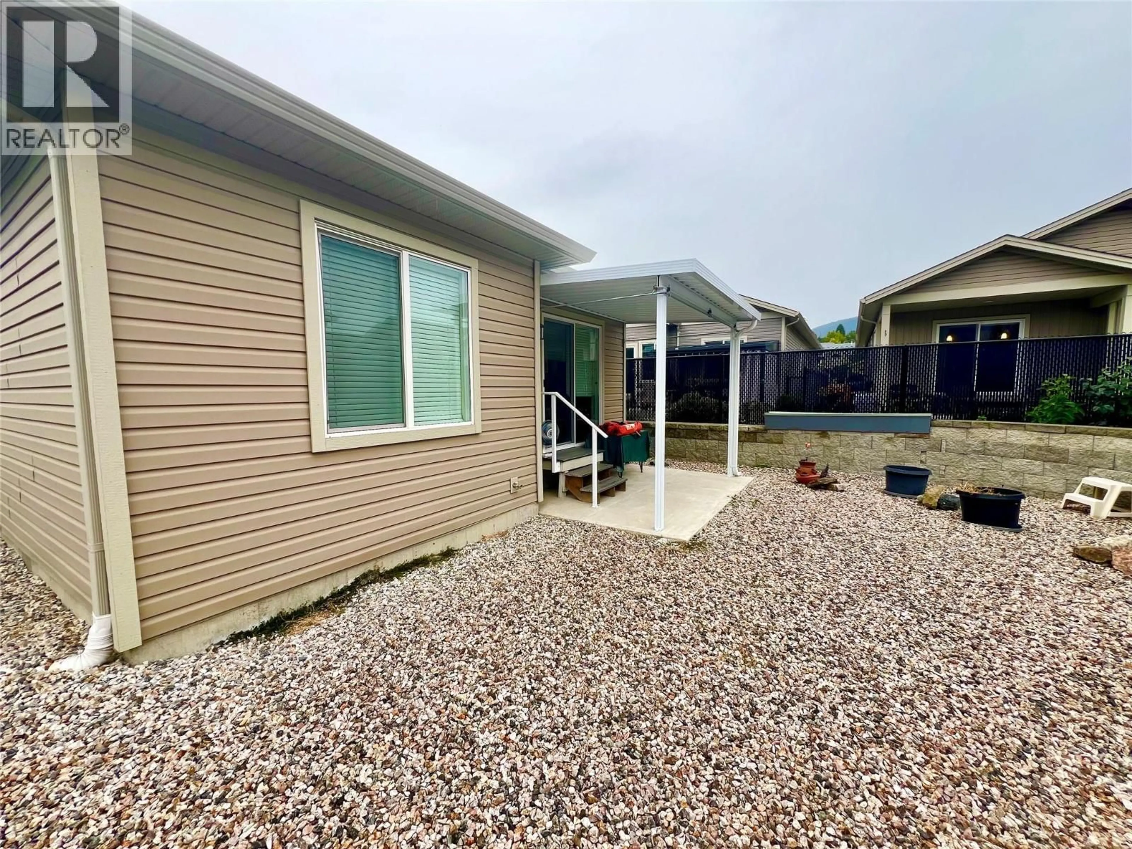 Home with vinyl exterior material, water/lake/river/ocean view for 59 - 2100 55 AVENUE, Vernon British Columbia V1T9Y6