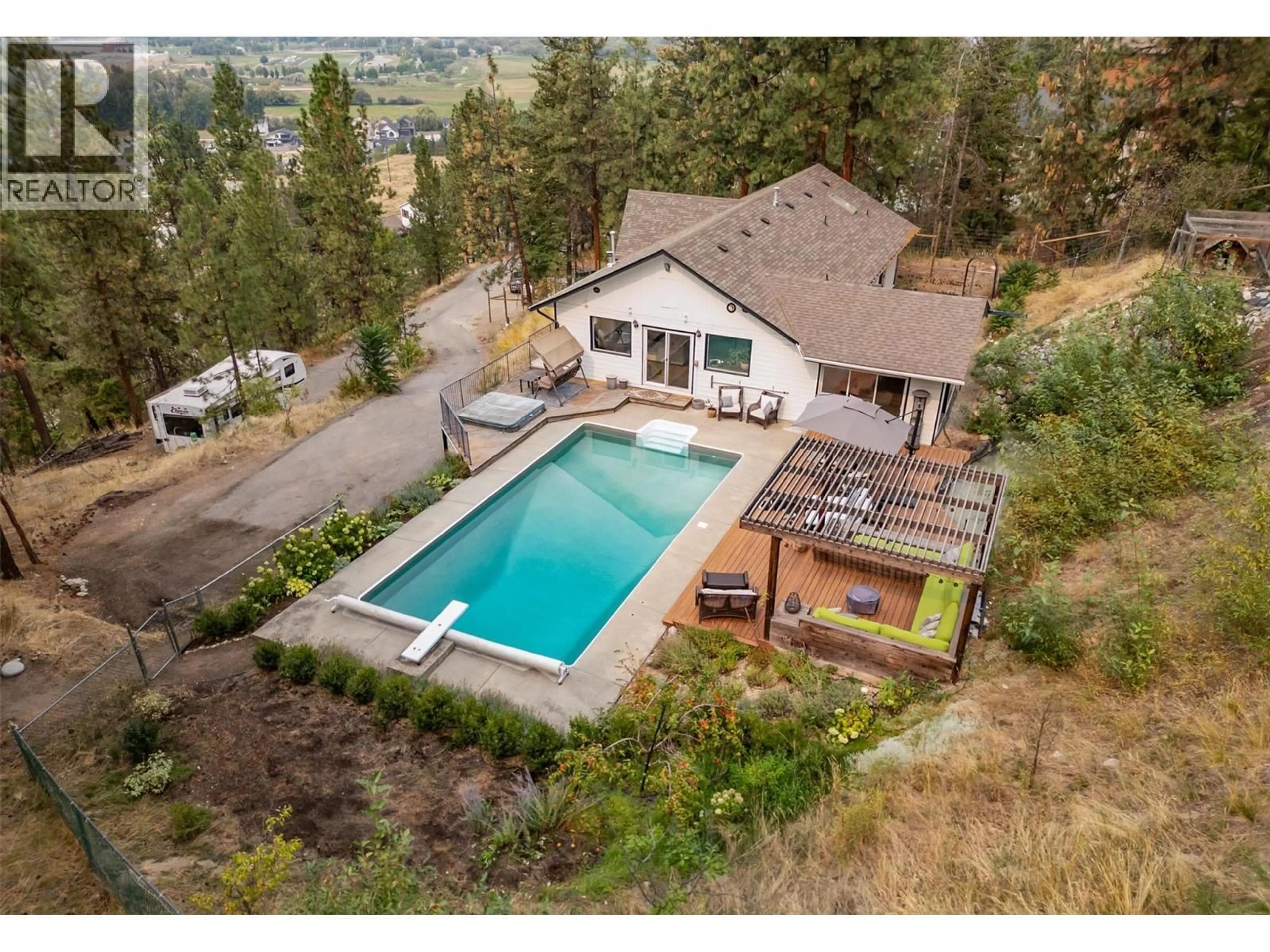 A pic from outside/outdoor area/front of a property/back of a property/a pic from drone, water/lake/river/ocean view for 965 BARTHOLOMEW COURT, Kelowna British Columbia V1W4N2