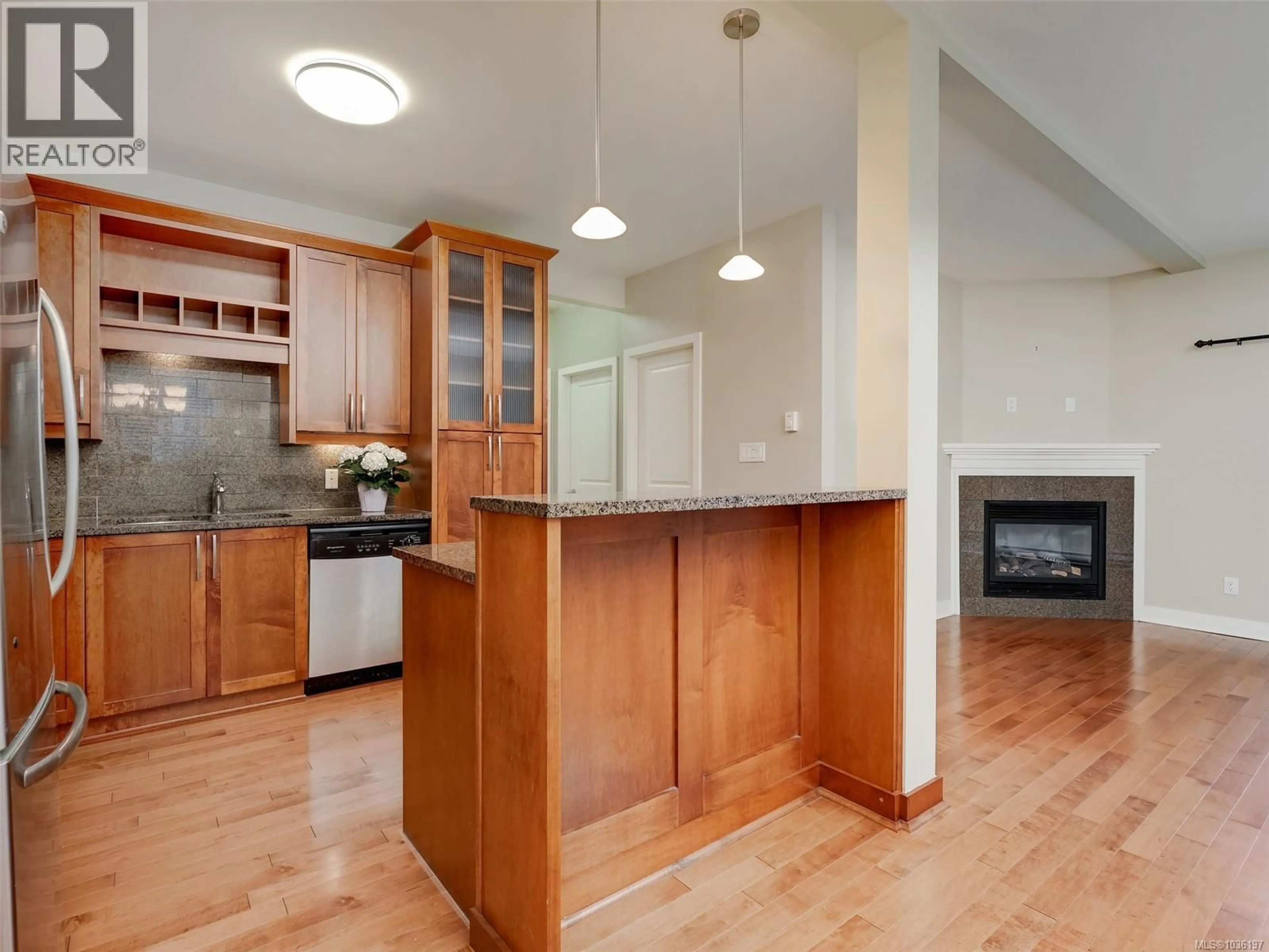 Open concept kitchen, wood/laminate floor for 2 - 1217 MCKENZIE STREET, Victoria British Columbia V8V2W6