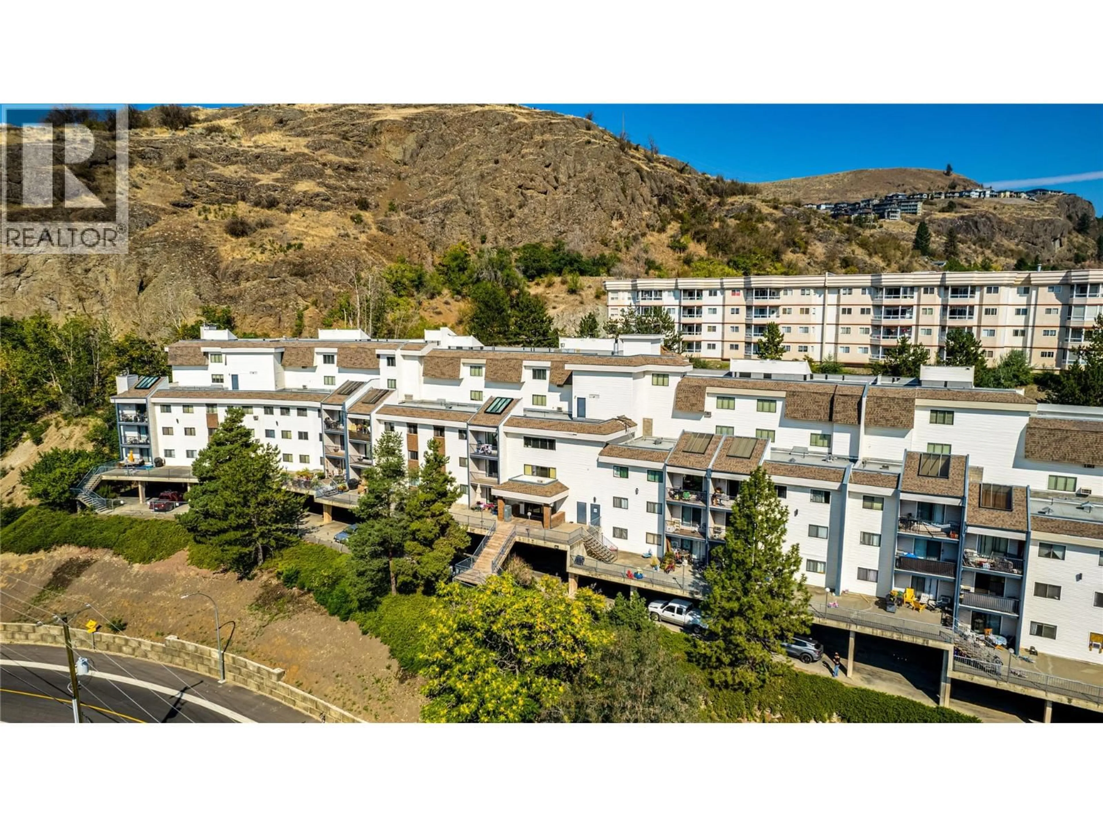 A pic from outside/outdoor area/front of a property/back of a property/a pic from drone, unknown for 208 - 3901 32 AVENUE, Vernon British Columbia V1T8M3