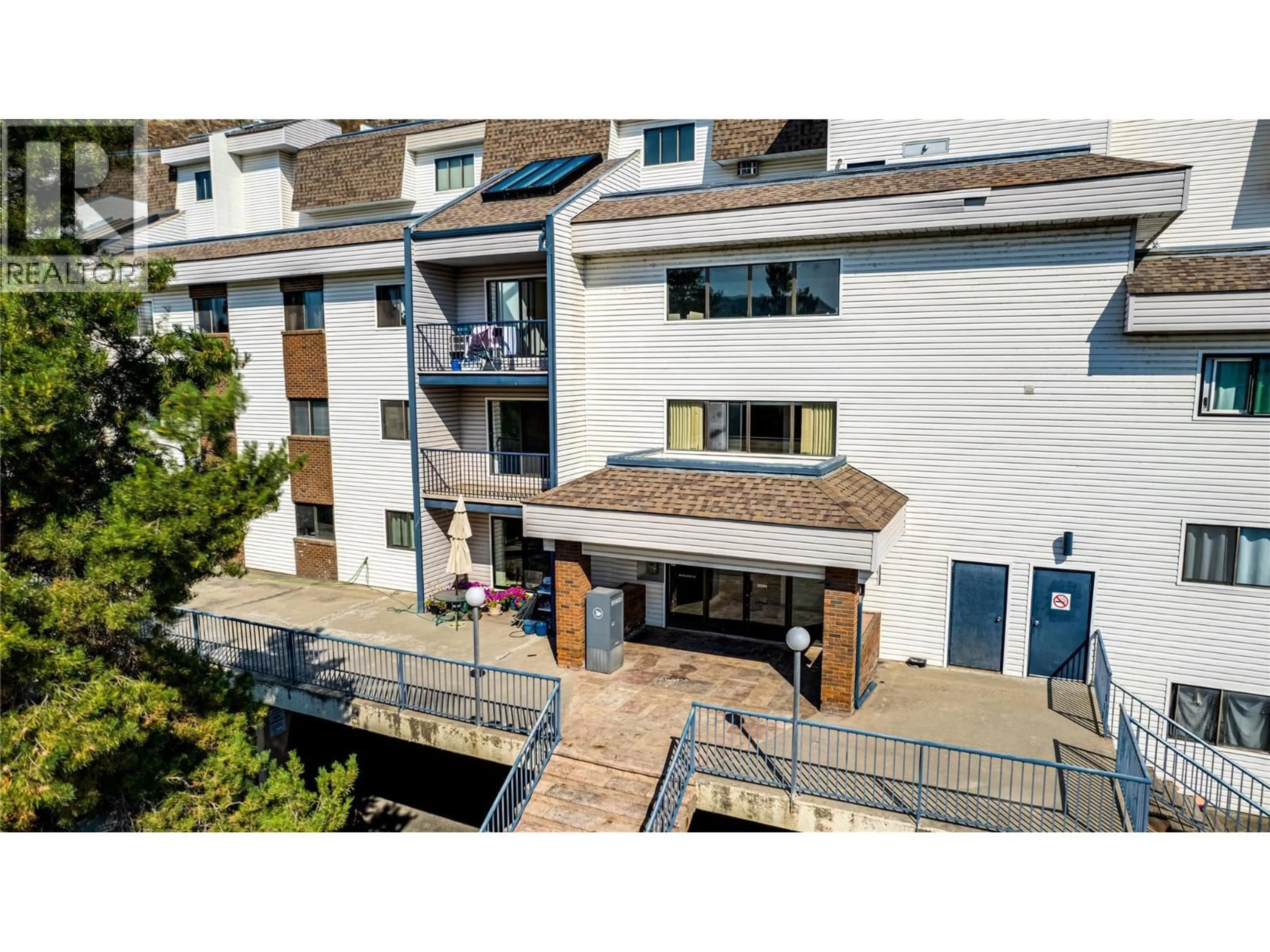 A pic from outside/outdoor area/front of a property/back of a property/a pic from drone, unknown for 208 - 3901 32 AVENUE, Vernon British Columbia V1T8M3