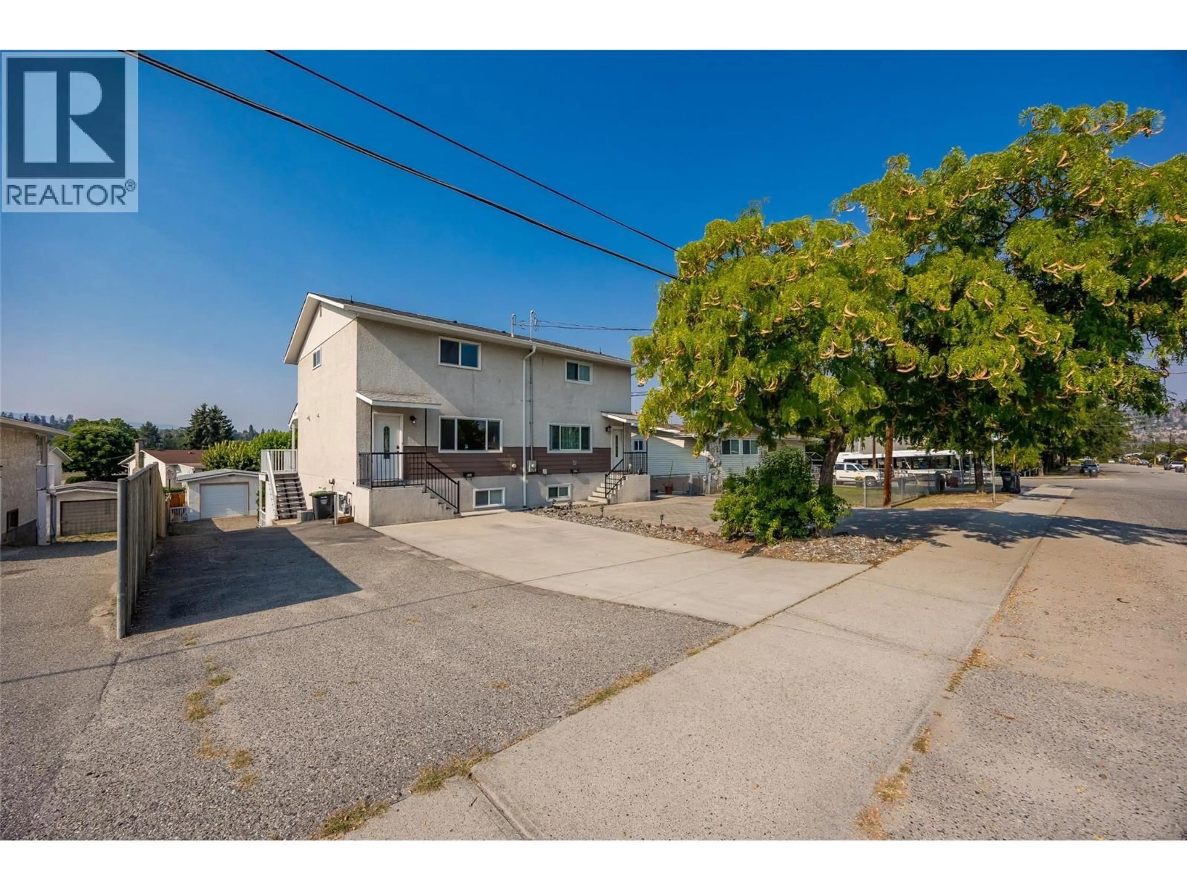 A pic from outside/outdoor area/front of a property/back of a property/a pic from drone, street for 685 HOLLYDELL ROAD, Kelowna British Columbia V1X1L4