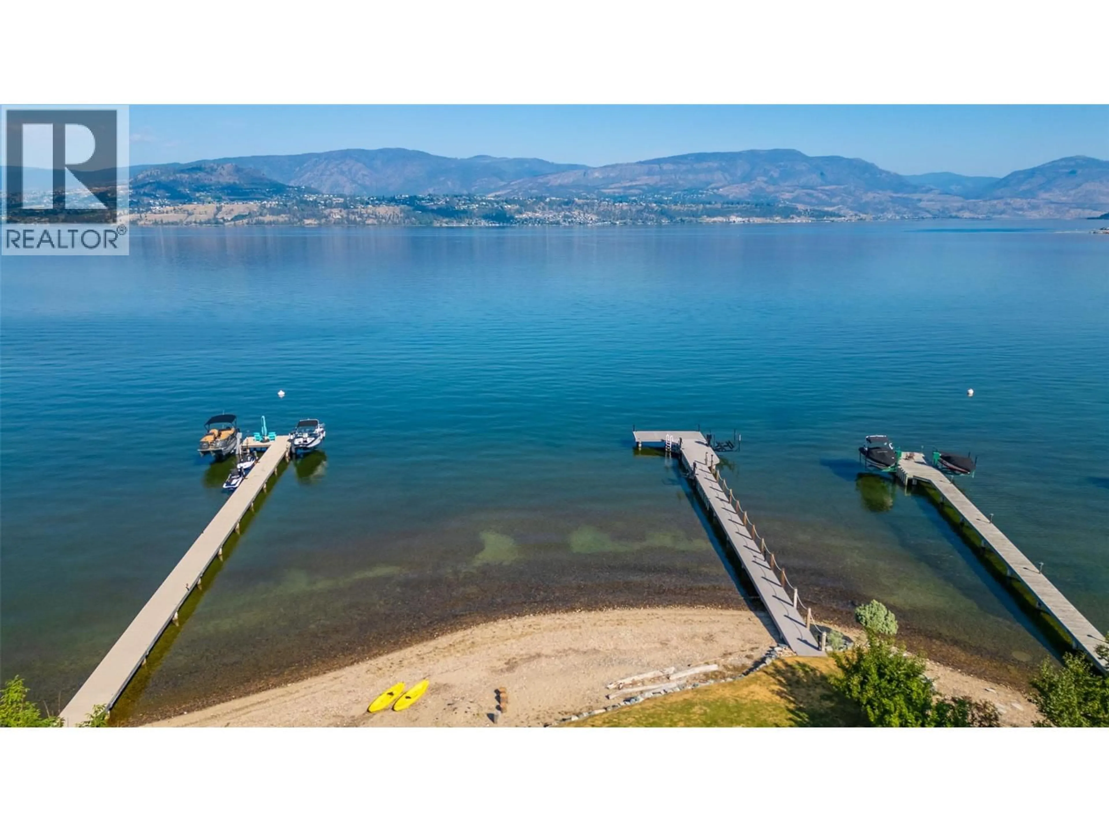 A pic from outside/outdoor area/front of a property/back of a property/a pic from drone, water/lake/river/ocean view for 4260 HOBSON ROAD, Kelowna British Columbia V1W1Y3